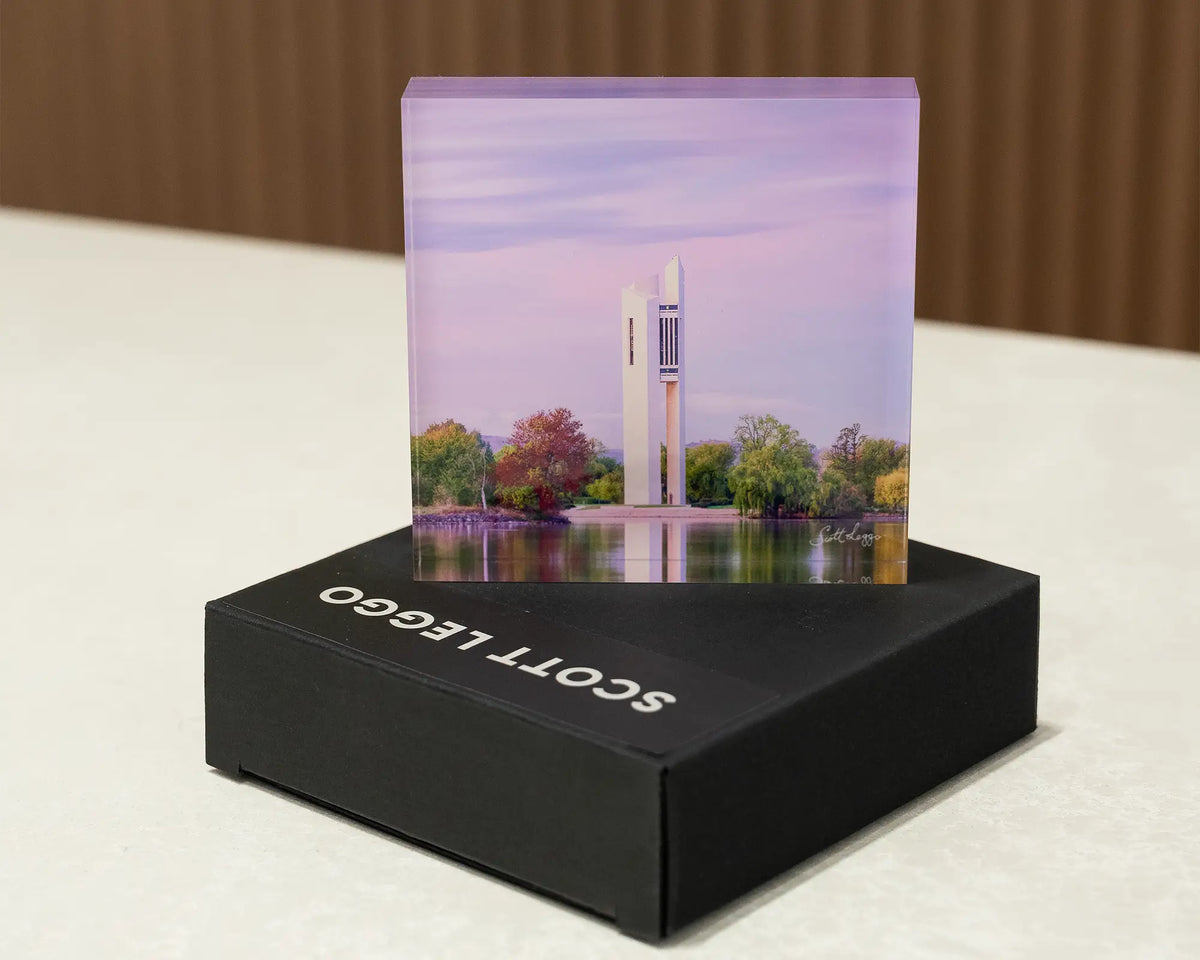 Magenta Dawn. Acrylic block of sunrise at National Carillon Canberra, on a gift box.