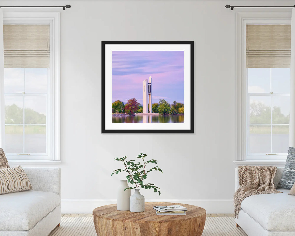 Magenta Dawn. National Carillon at sunrise wall art print with black frame hung on lounge room wall.