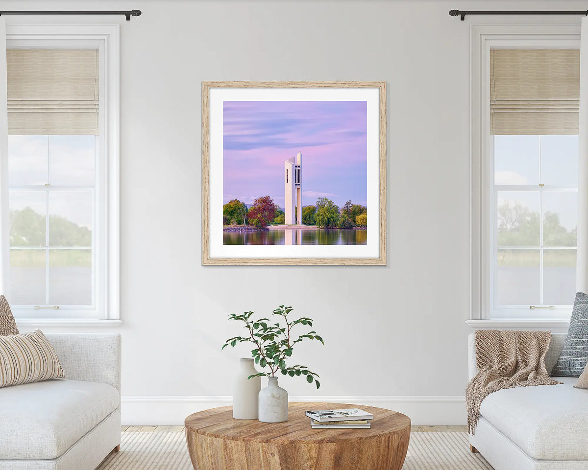 Magenta Dawn. National Carillon at sunrise wall art print with timber frame hung on lounge room wall.
