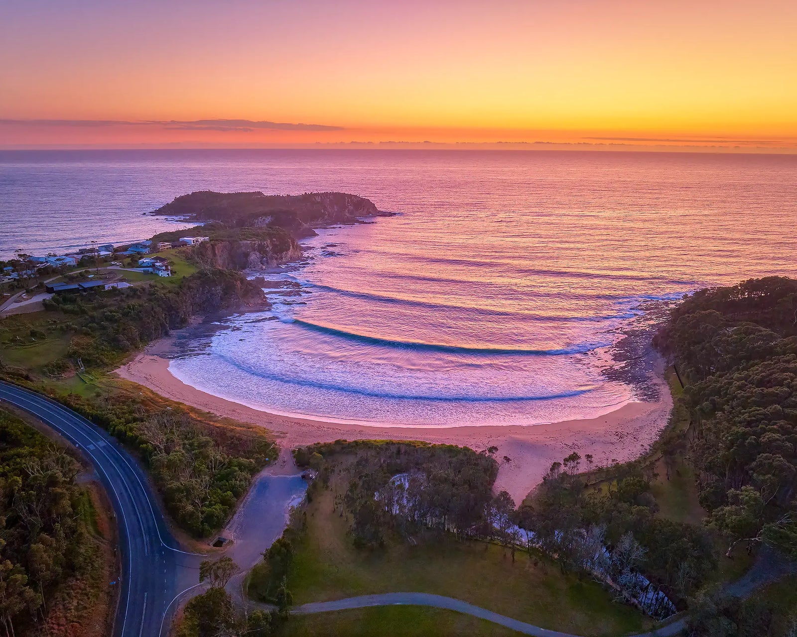 McKenzies Glow. McKenzies Beach at sunrise, South Coast, New South Wales.