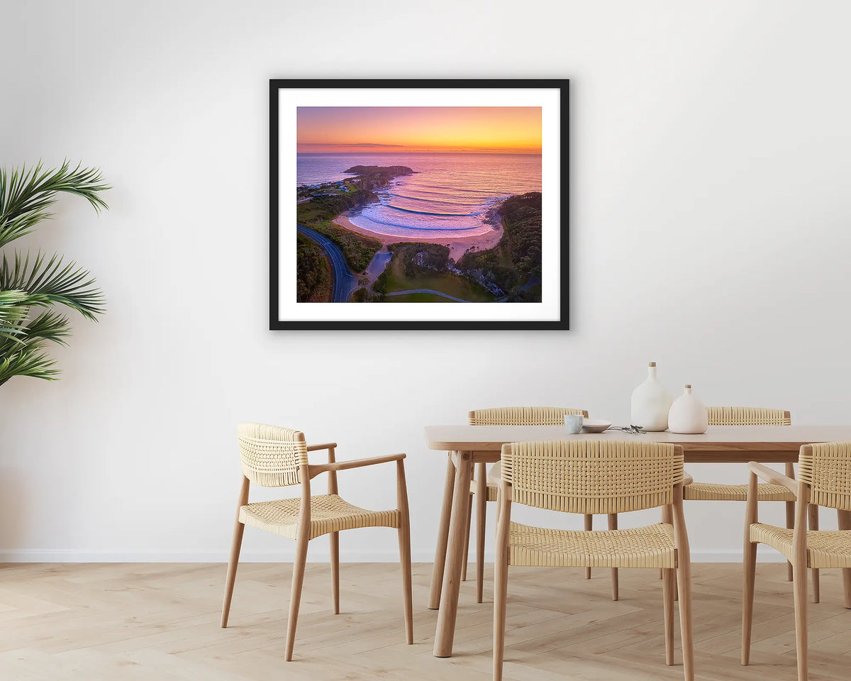 McKenzie&#39;s Glow. South Coast photographic wall art print with a black frame, hung in a dining room. 