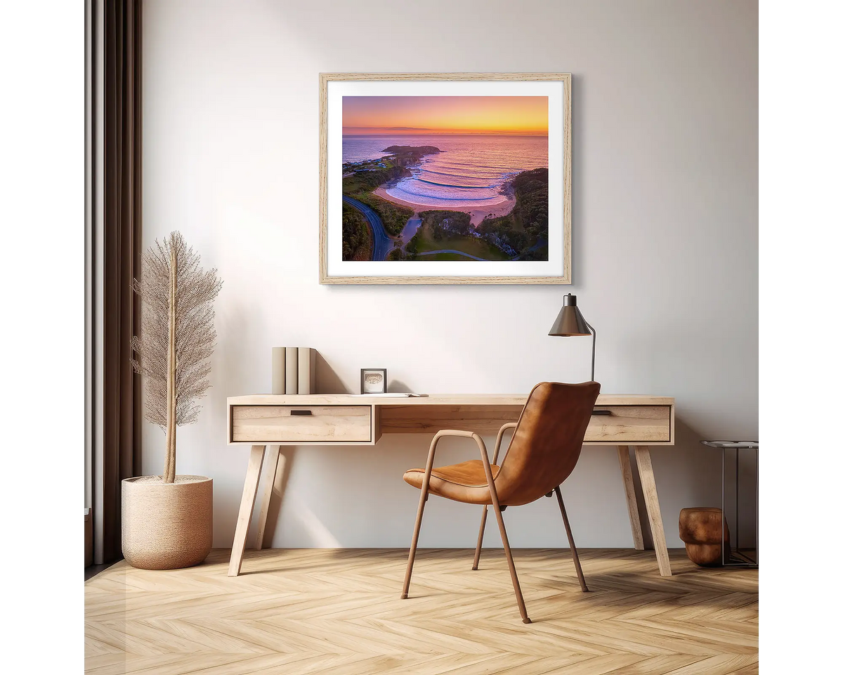 McKenzie&#39;s Glow. South Coast photographic wall art print with a Tassie oak frame, hung above a scandi office desk. 