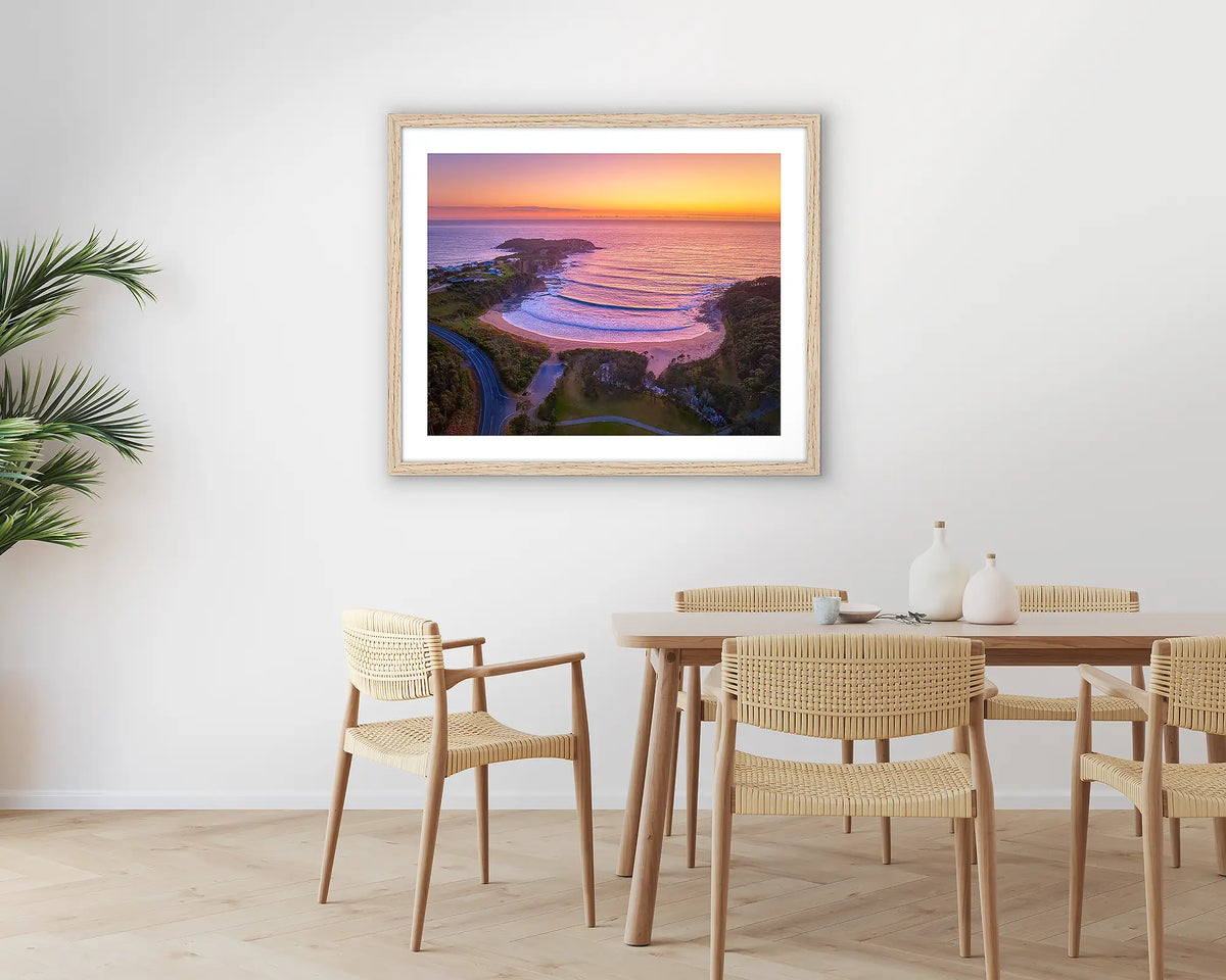 McKenzie&#39;s Glow. South Coast photographic wall art print with a white frame, hung in a dining room. 