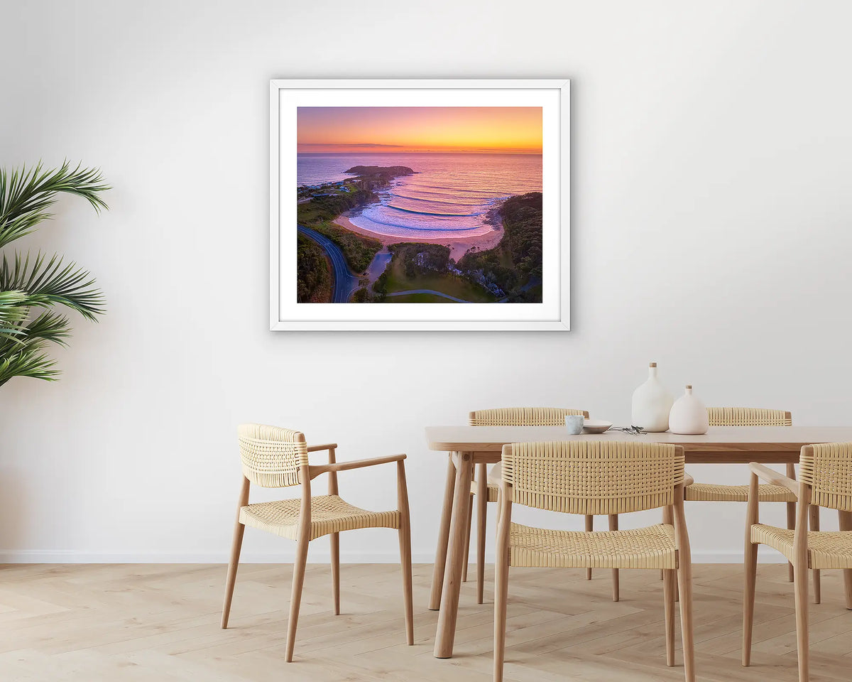 McKenzie&#39;s Glow. South Coast photographic wall art print with a white frame, hung in a dining room. 