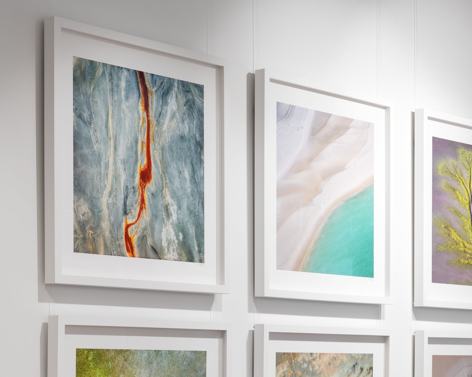 Framed abstract photograph of blue, white, red and yellow.