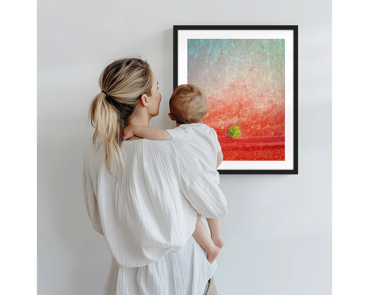 Mini. Abstract Kimberley artwork with a black frame, being admired by a mother and baby. 