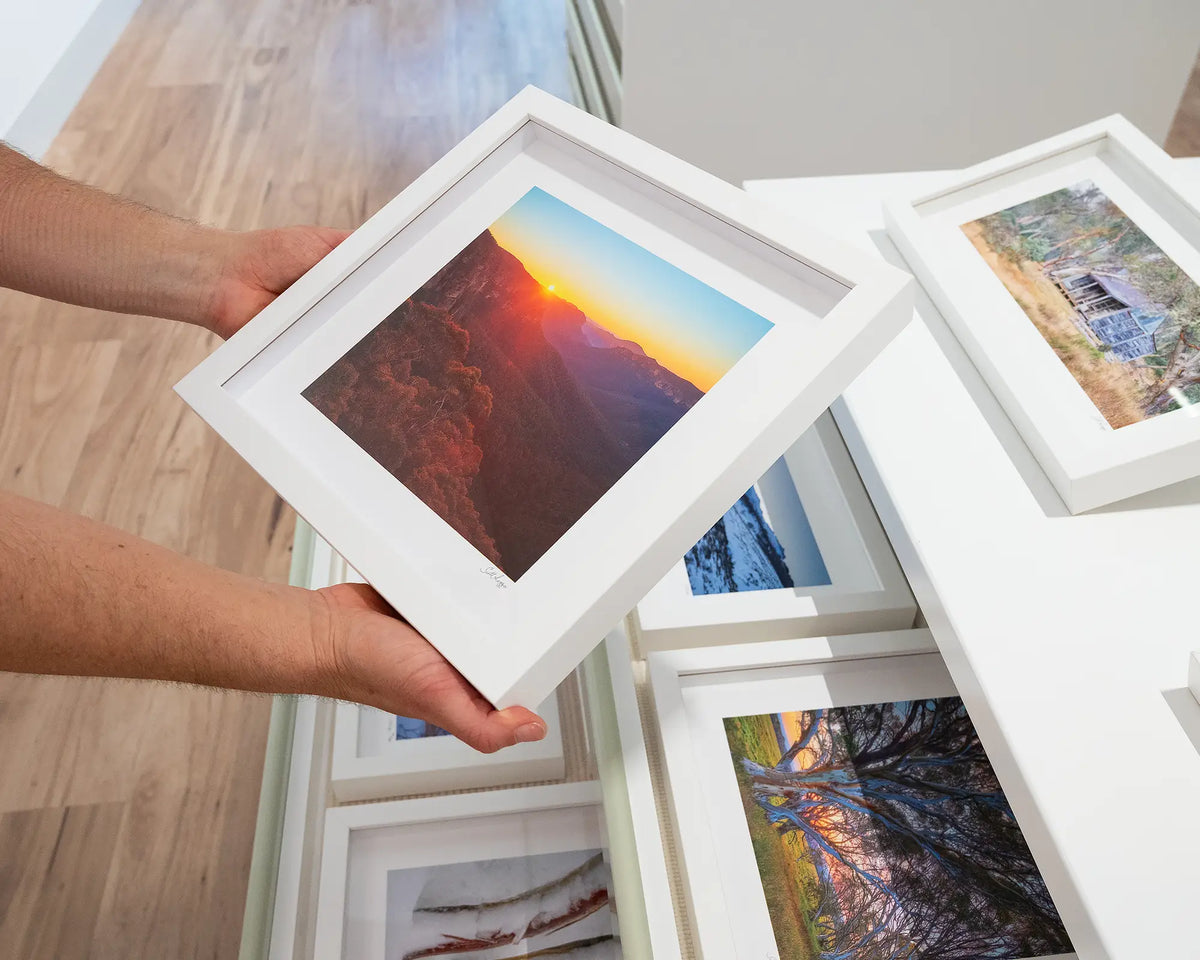 Moment In Time. Sun rising over Grose Valley, Blue Mountains National Park, with white frame, hand held in gallery.