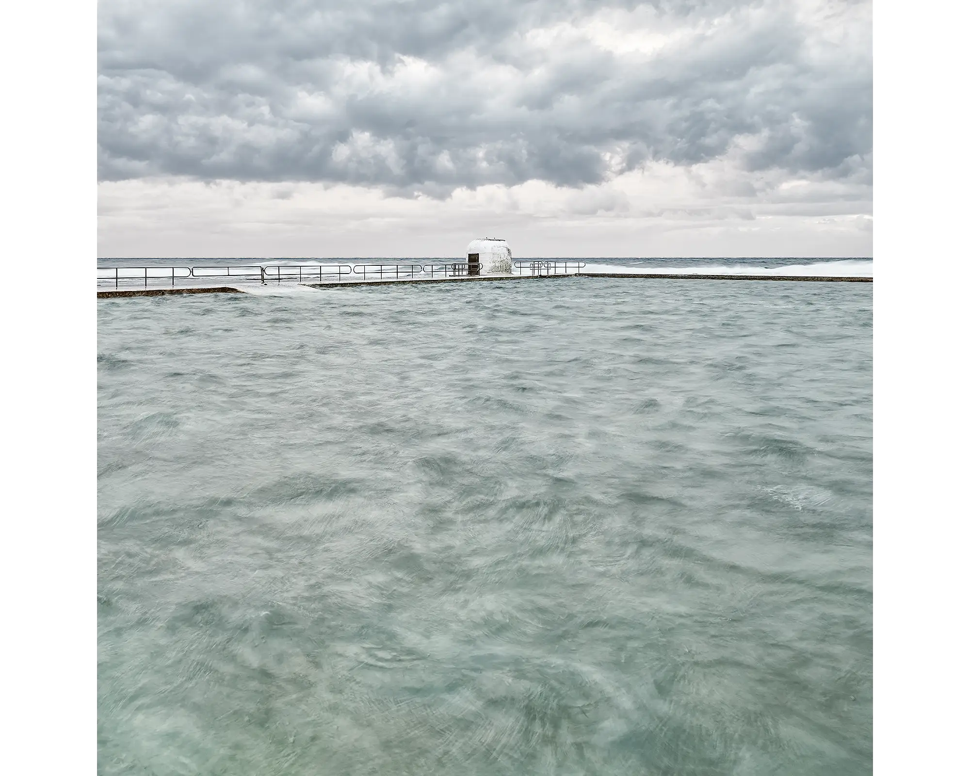 Moody Merewether. Storm clouds over Merewether Baths, Newcastle.