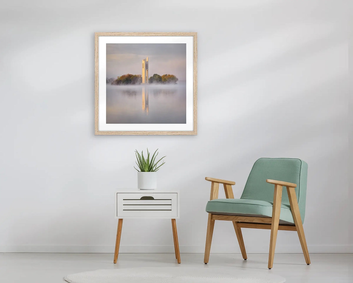Morning Fog. Wall art print of the National Carillon in Canberra, framed with a Tassie Oak frame, and hung above a small table. 