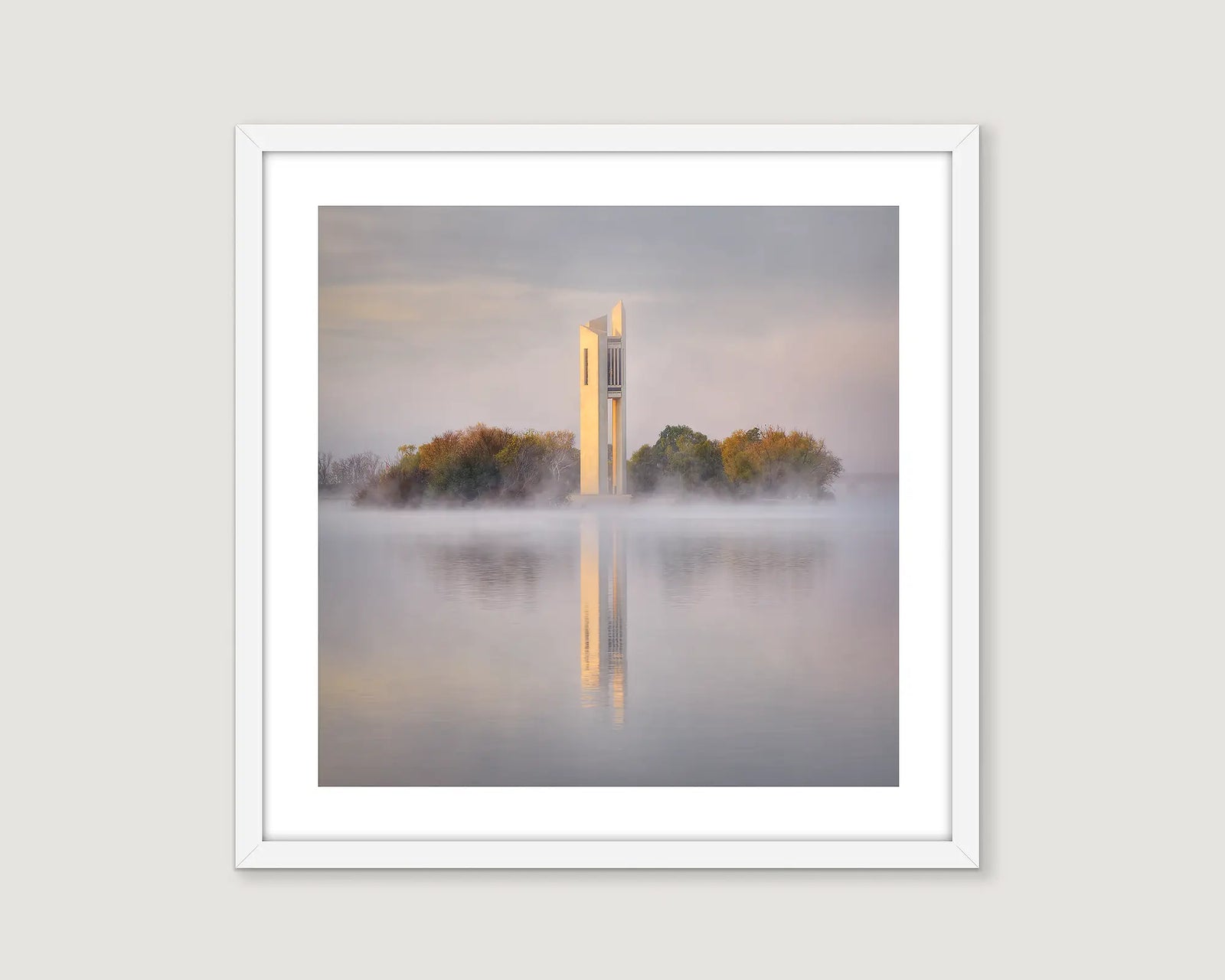 Framed photograph of the Carillon with trees surrounded by fog.