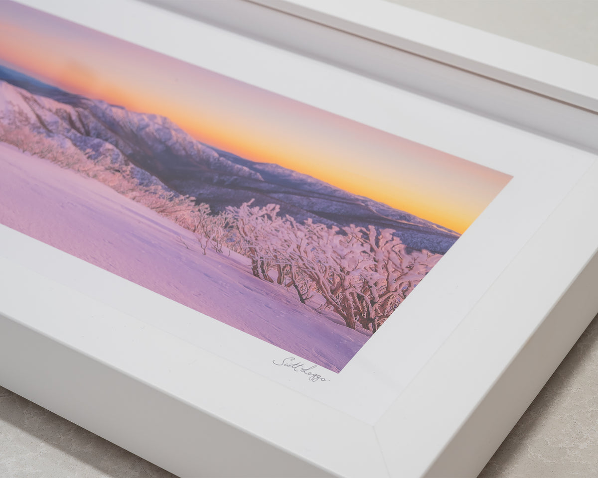 Morning Glory. Sunrise over Mount Feathertop, Victoria, with white frame, corner close-up details.