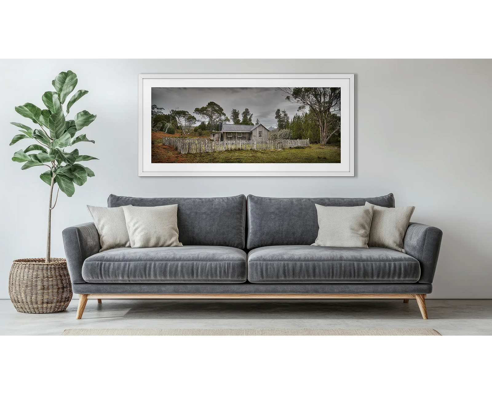 Framed photograph of a Mount Kate House on a cloudy day.