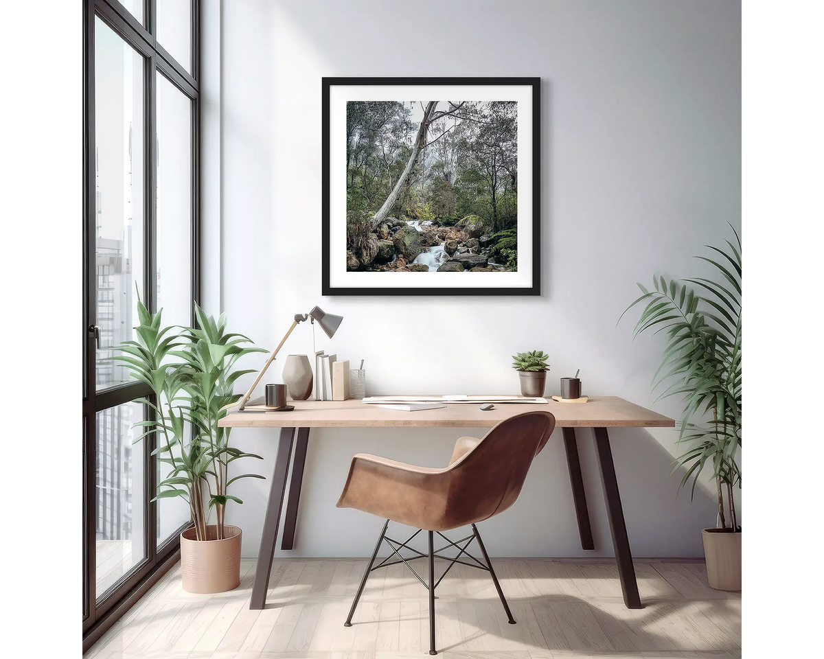 Mountain Flow. Mount Buffalo photographic wall art print with a black frame, hung above a small desk. 