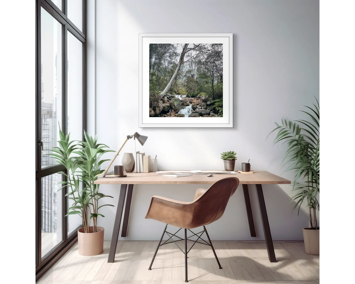 Mountain Flow. Mount Buffalo photographic wall art print with a white frame, hung above a small desk. 