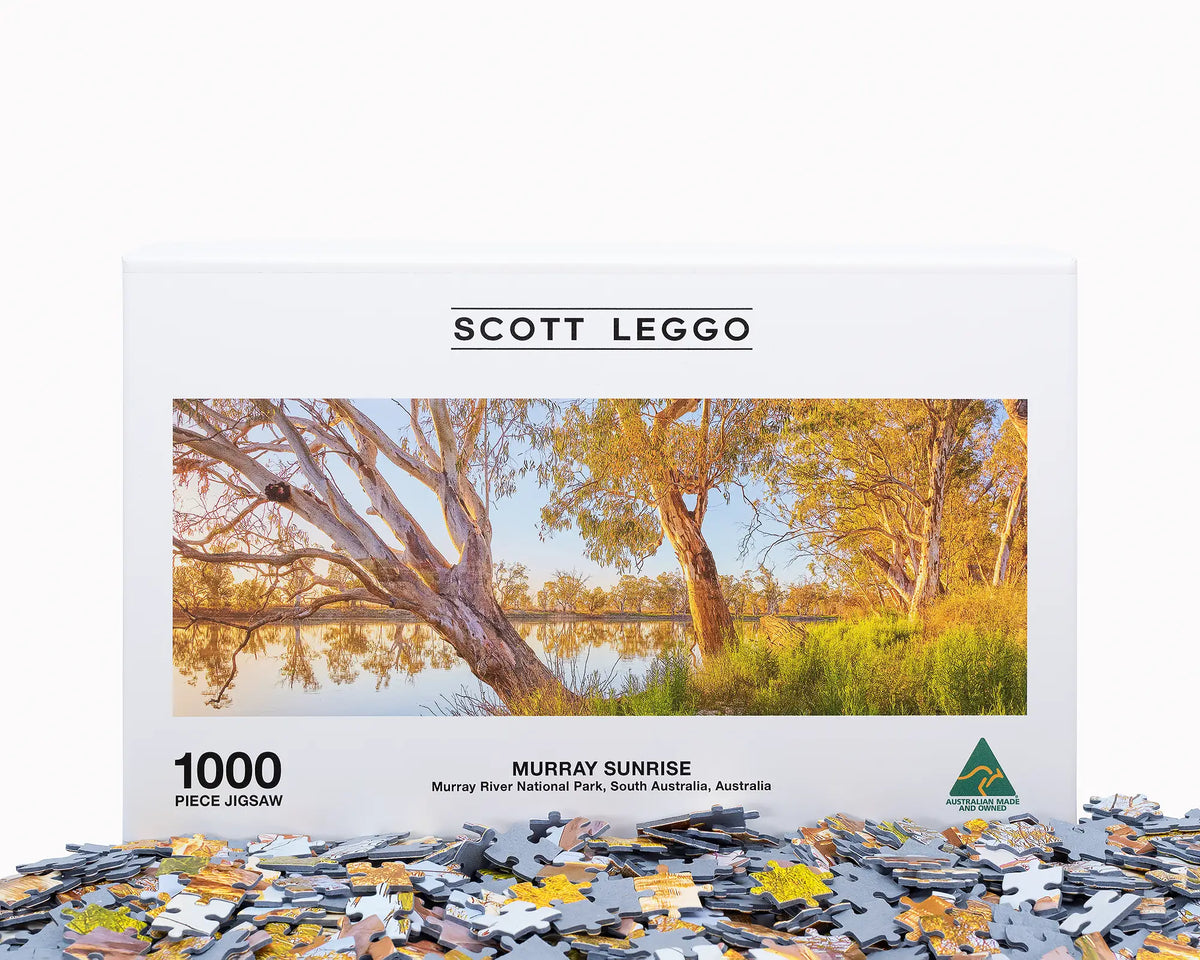 Murray Sunrise 1000 piece jigsaw puzzle box with jigsaw pieces.