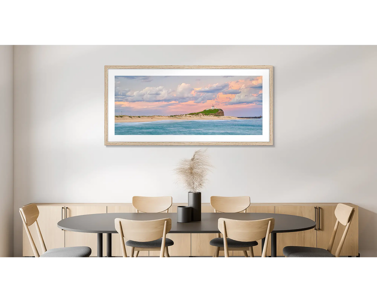 Newcastle Magic. Photographic wall art print of Nobbys beach, Newcastle, with a timber frame and hung on a dining room wall