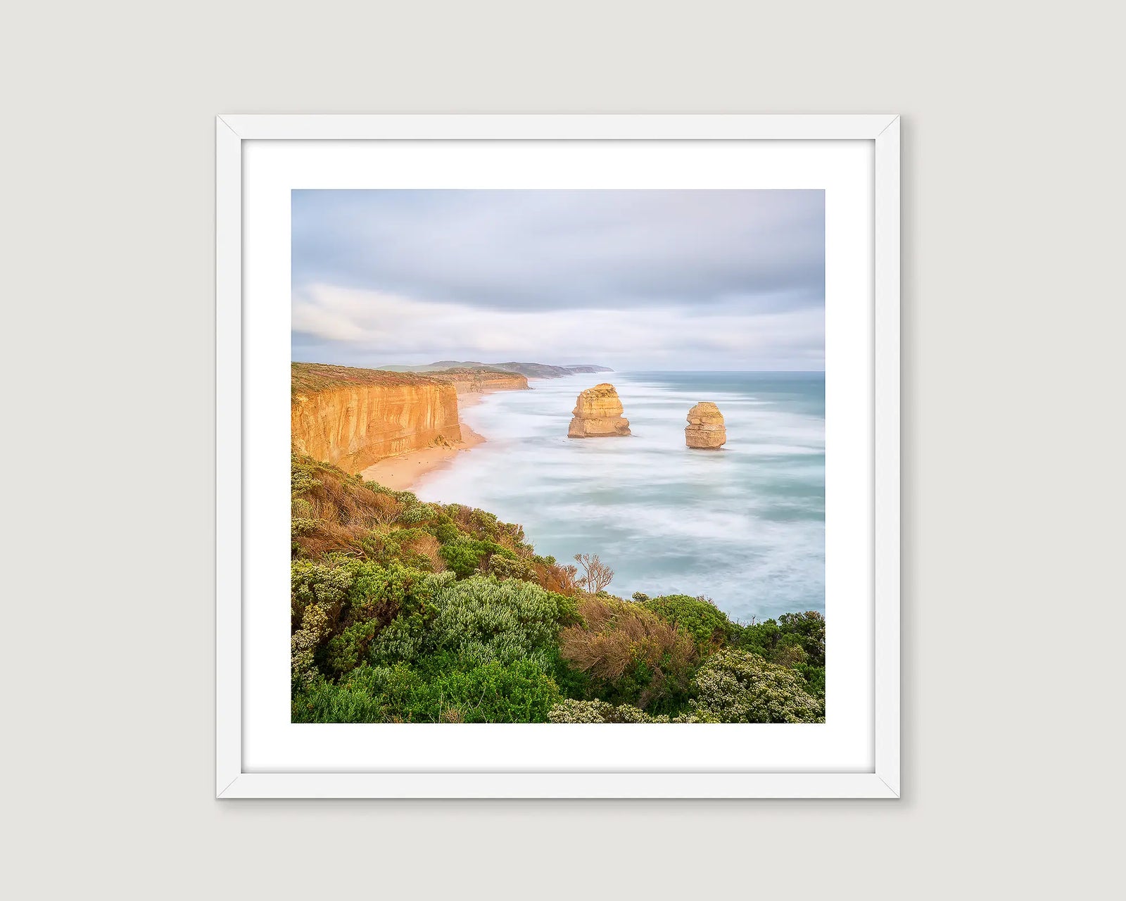 Framed photograph of a coastal landscape of Gog and Magog with cliffs and ocean.