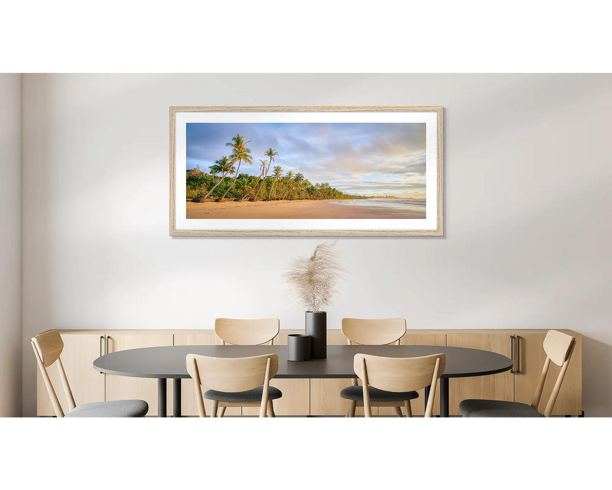 Ocean Breeze. Photographic wall art print of Mission beach, Queensland, with a timber frame, hung on a dining room wall