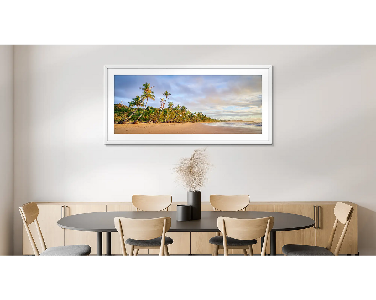 Ocean Breeze. Photographic wall art print of Mission beach, Queensland, with a white frame, hung on a dining room wall