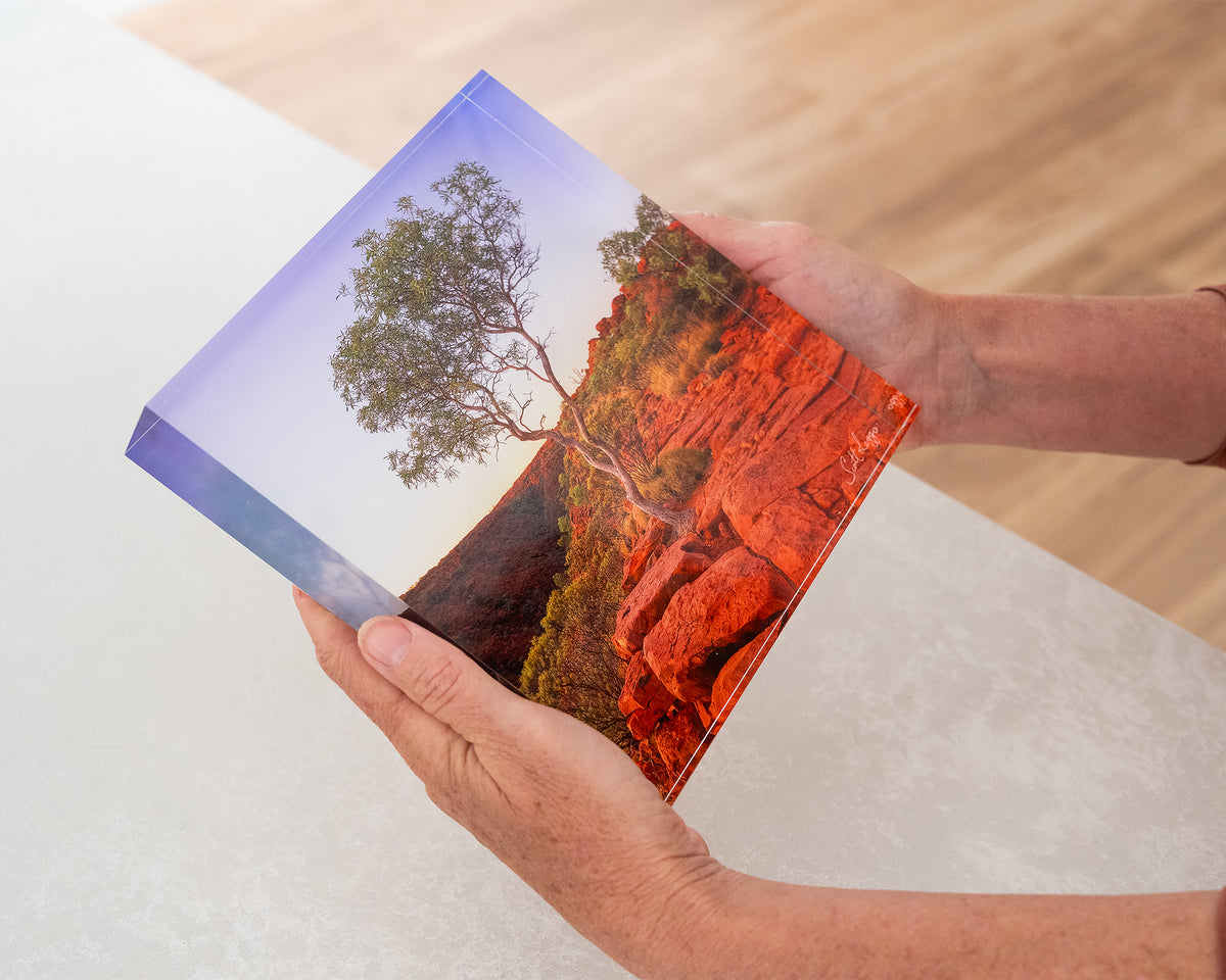 On The Edge. 19cm acrylic block Kings Canyon Watarrka National Park, Northern Territory, held in hands.