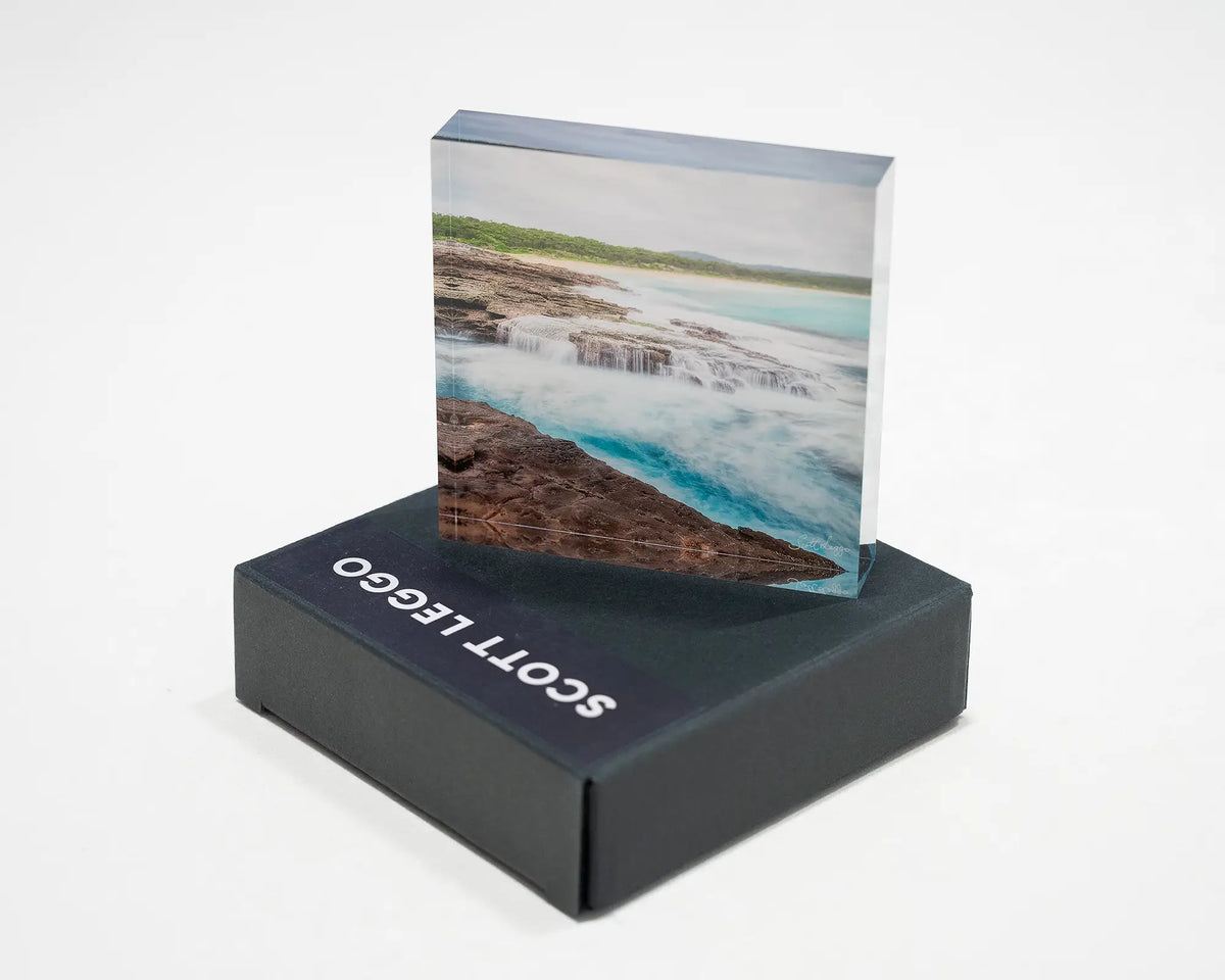 On The Rocks. Acrylic block South Durras Beach, Eurobodalla, placed on a gift box.