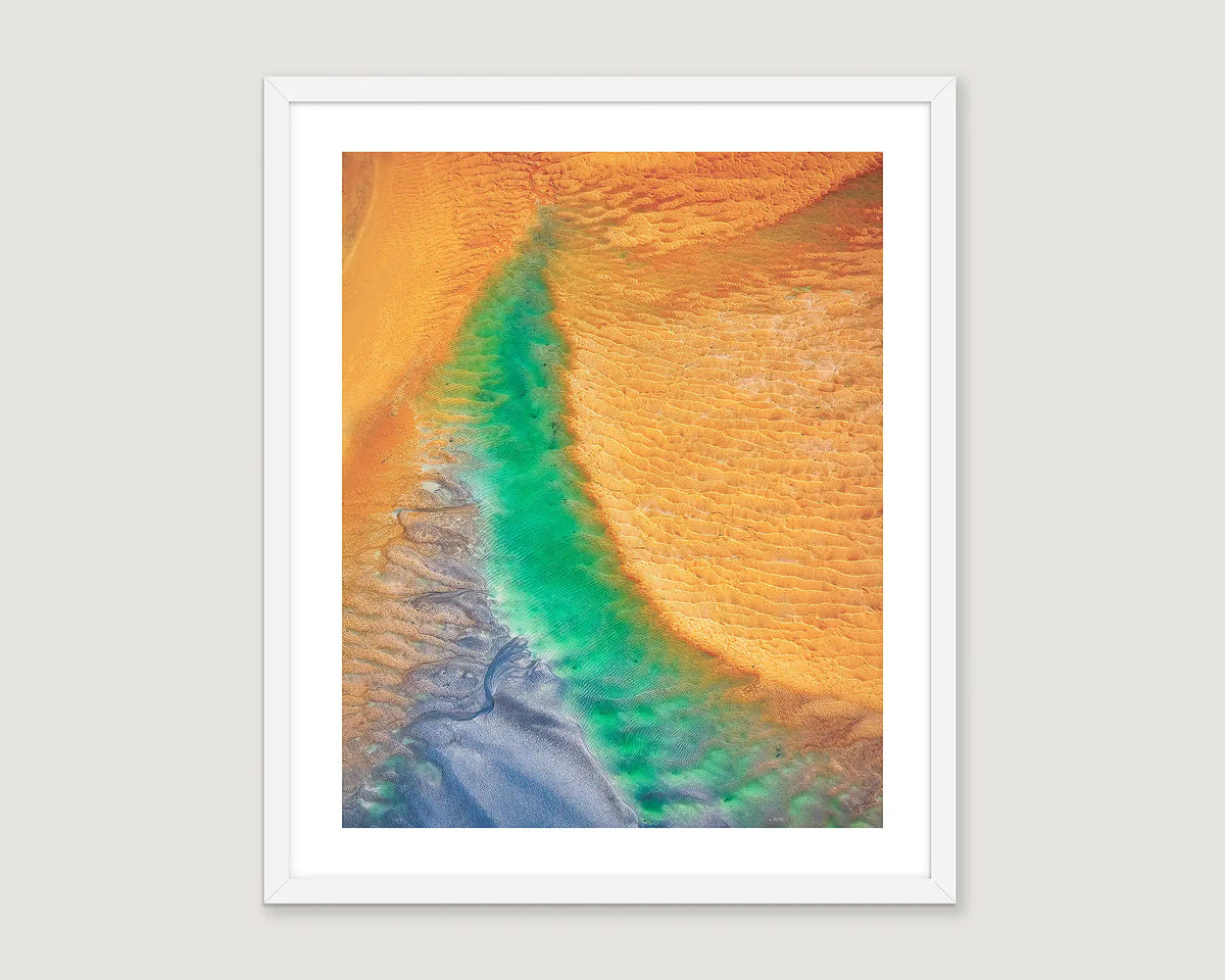 Framed abstract photograph with orange, yellow, turquoise and blue colours.