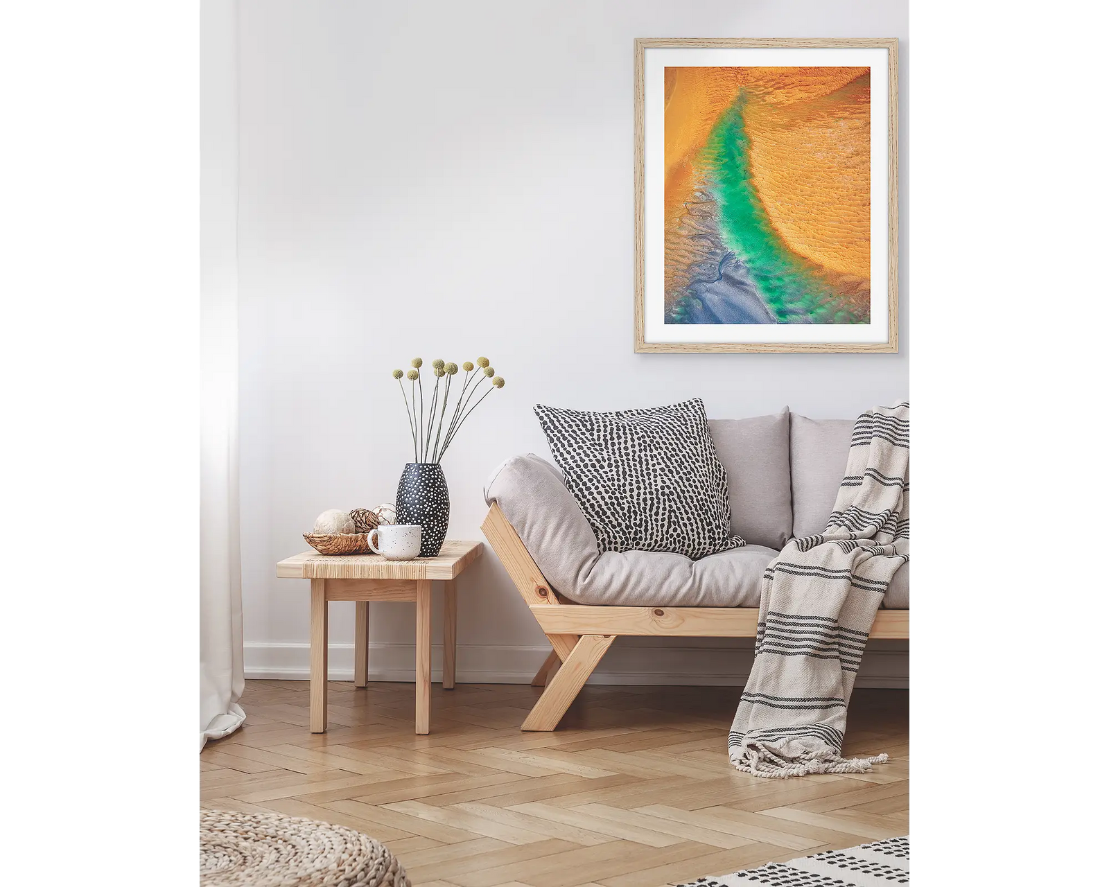 Framed abstract photograph with orange, yellow, turquoise and blue colours.