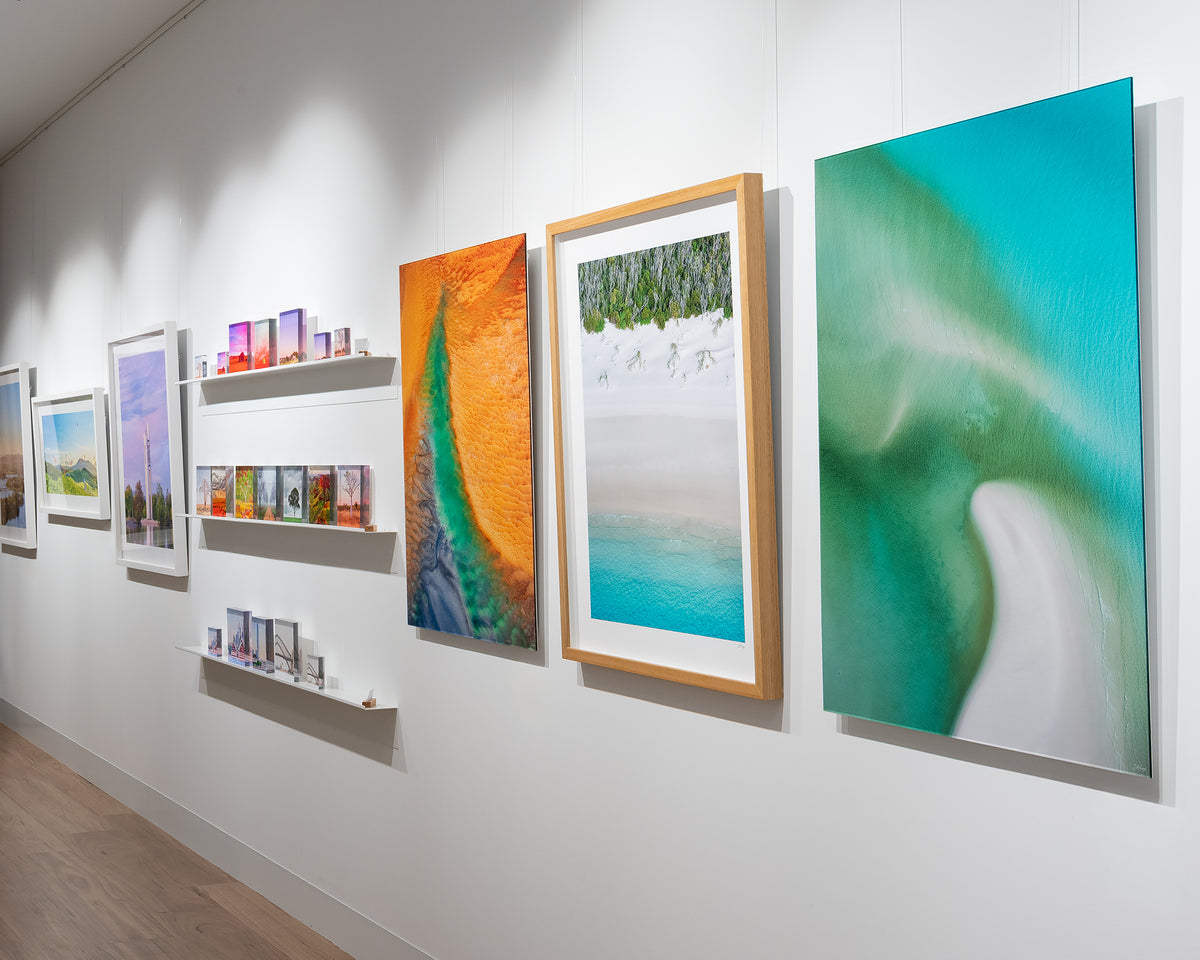 Opal Waters. Aerial abstract artwork Whitsunday Island, frameless acrylic in gallery with more coastal artworks.