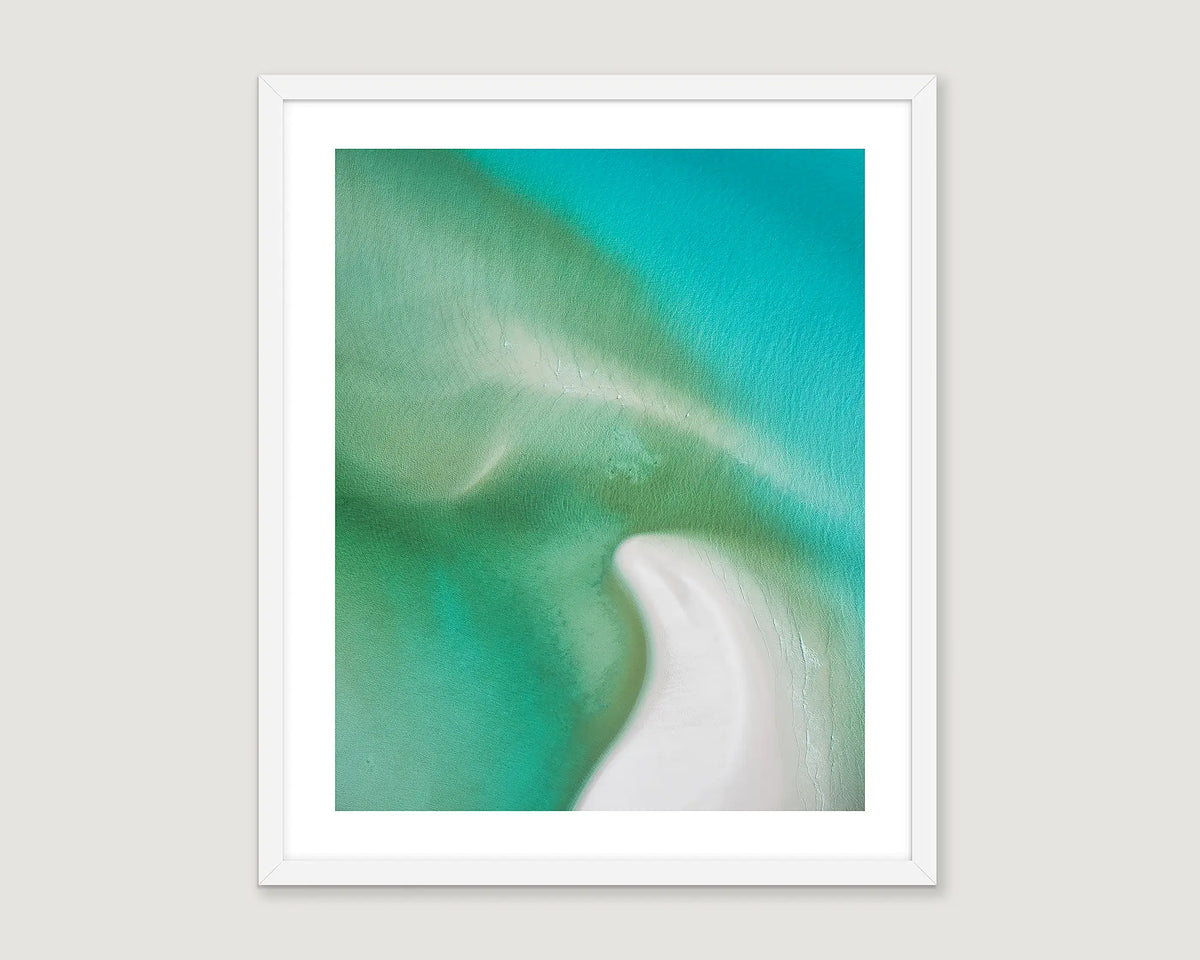 Framed abstract photograph with green, turquoise, blue and which colours.