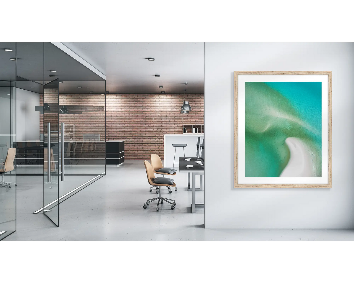 Opal Waters. Whitsunday wall art print with a wood frame, in a modern office. 