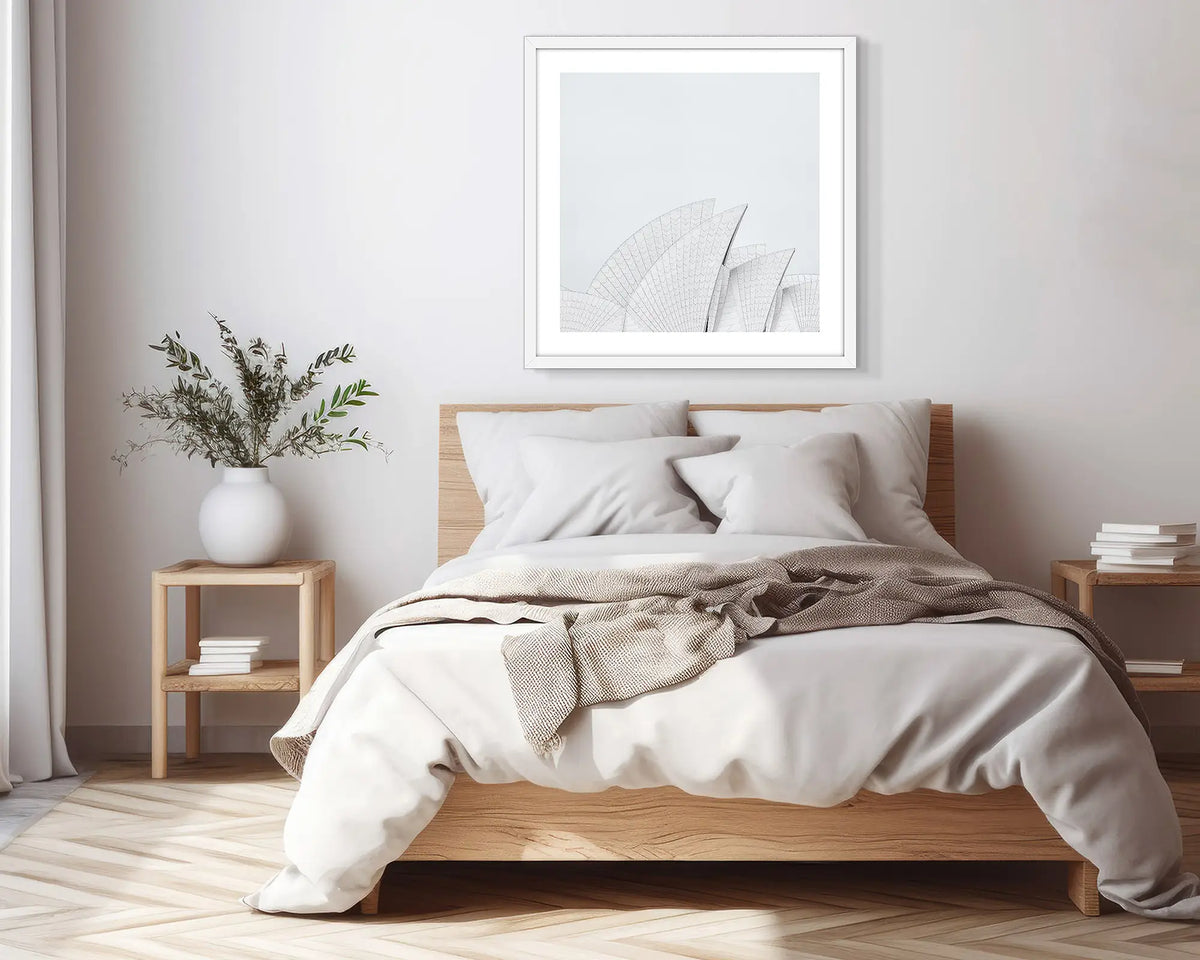 Opera House Curves. White framed, Sydney Opera House wall art print, in a scandi-themed bedroom.