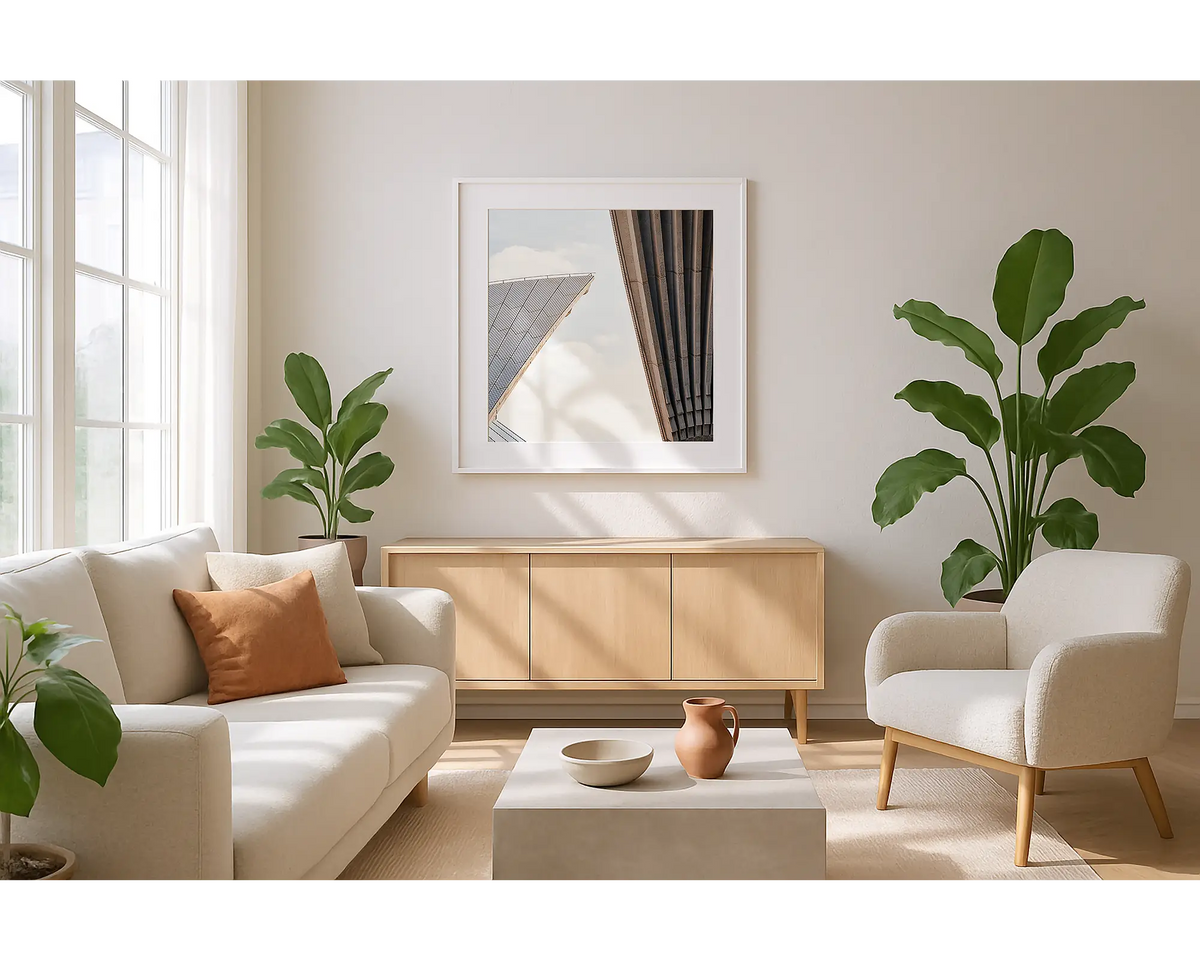 Opera Shapes. Wall art print of a Sydney Opera House, with a white frame hung in a sunlit lounge room. 