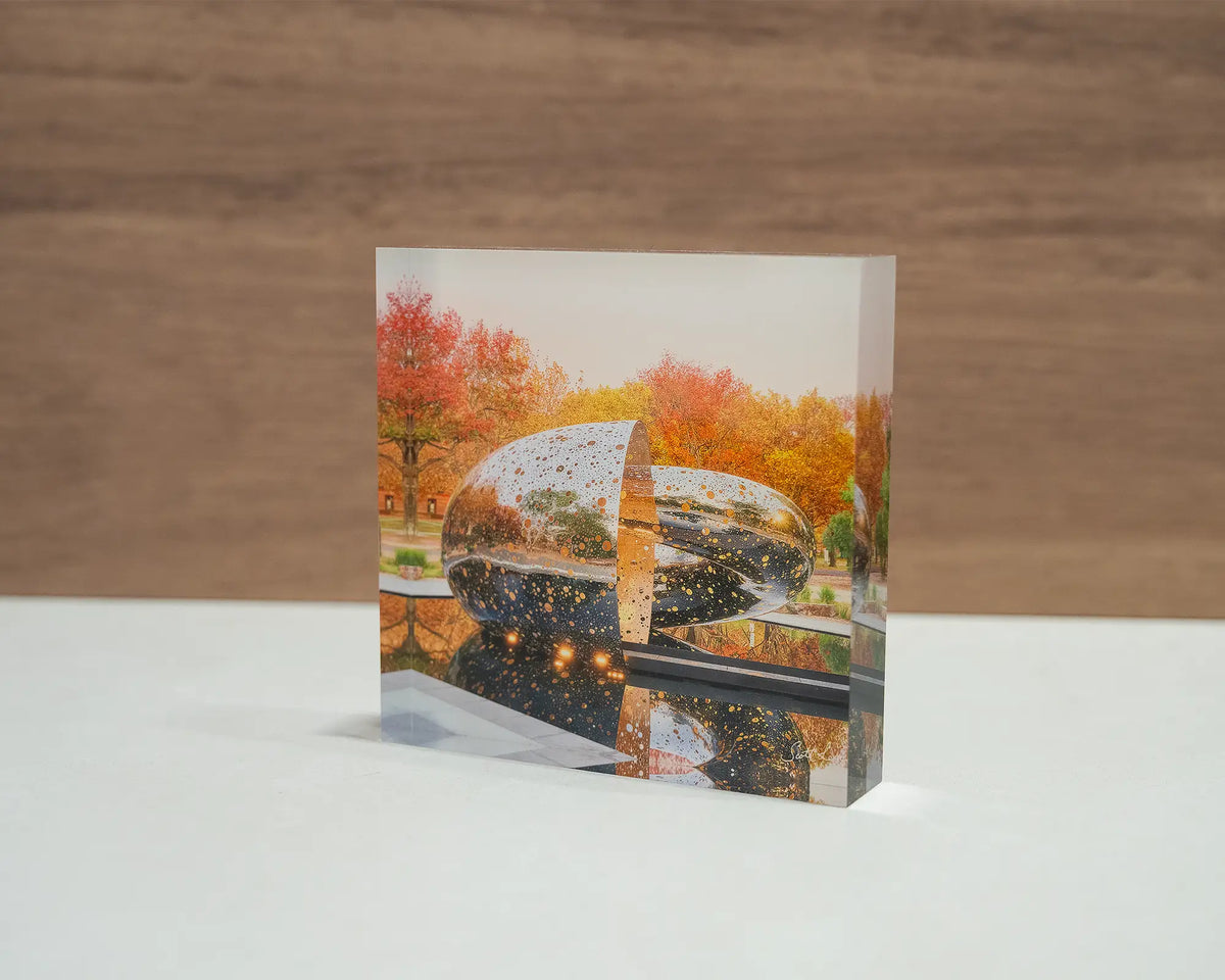 Orange Cocoon. Acrylic block of Ouroboros sculpture National Gallery of Australia Canberra, in Autumn.