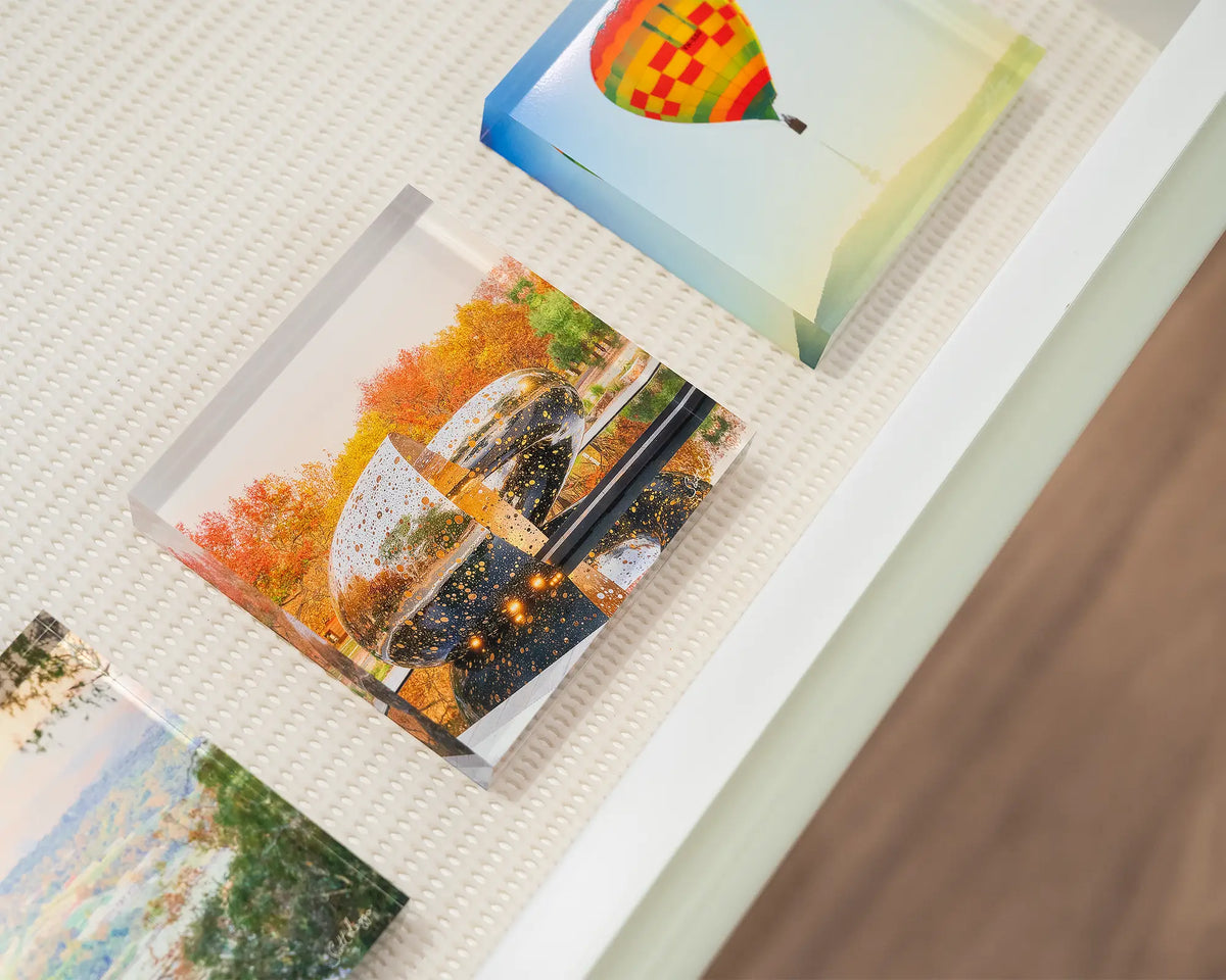 Orange Cocoon. Acrylic block of Ouroboros sculpture National Gallery of Australia, in gallery drawer with Canberra blocks.