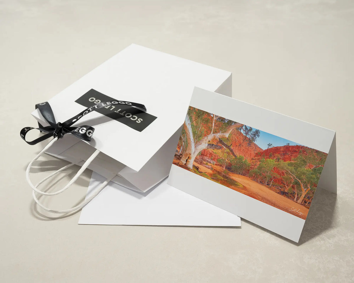 Ormiston Sanctuary greeting card of sunrise at Ormiston Gorge, with Scott Leggo gift bag.
