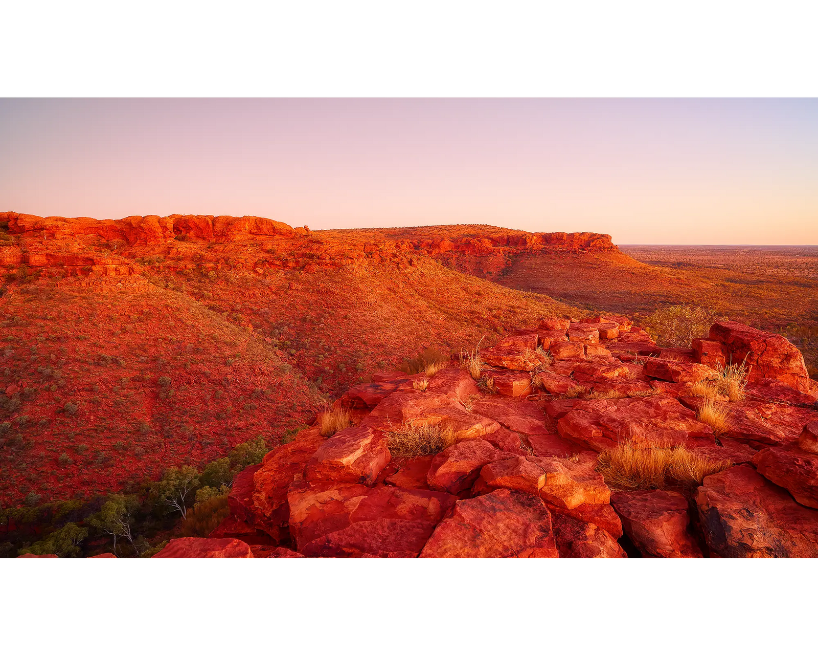 Framed photograph of the rocky cliffs of Kings Canyon under a blue sky.