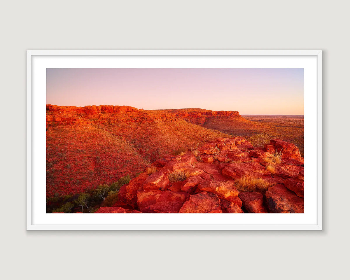 Framed photograph of the rocky cliffs of Kings Canyon under a blue sky.