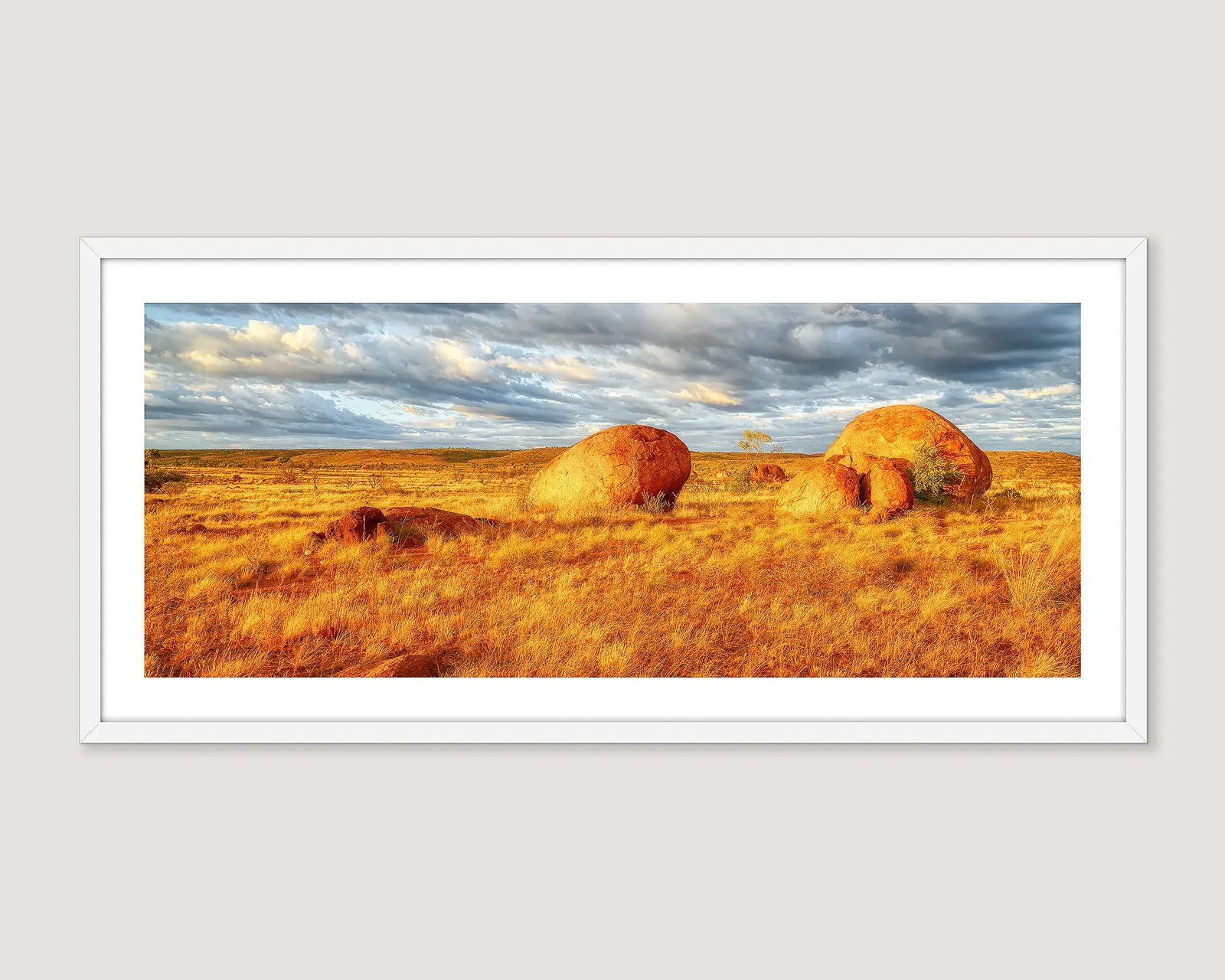 Framed artwork of Devils Marbles at sunrise.