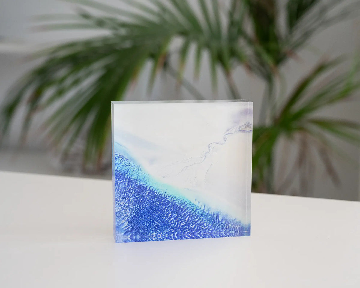 Outlet. Acrylic block aerial view of Roebuck Bay Western Australia, styled in a coastal home.