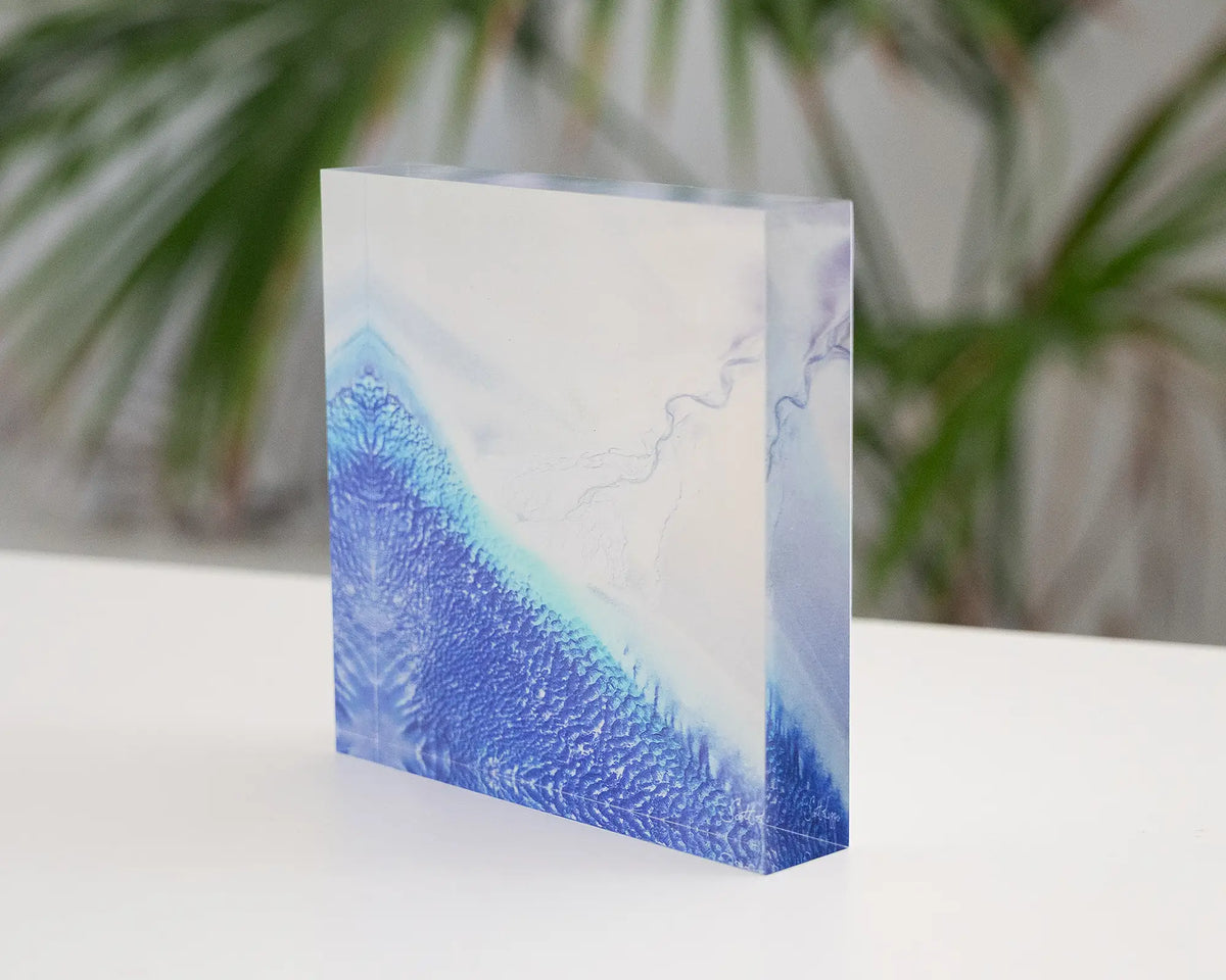 Outlet. Acrylic block of Roebuck Bay Western Australia, in a coastal home, side view showing 3D effect.
