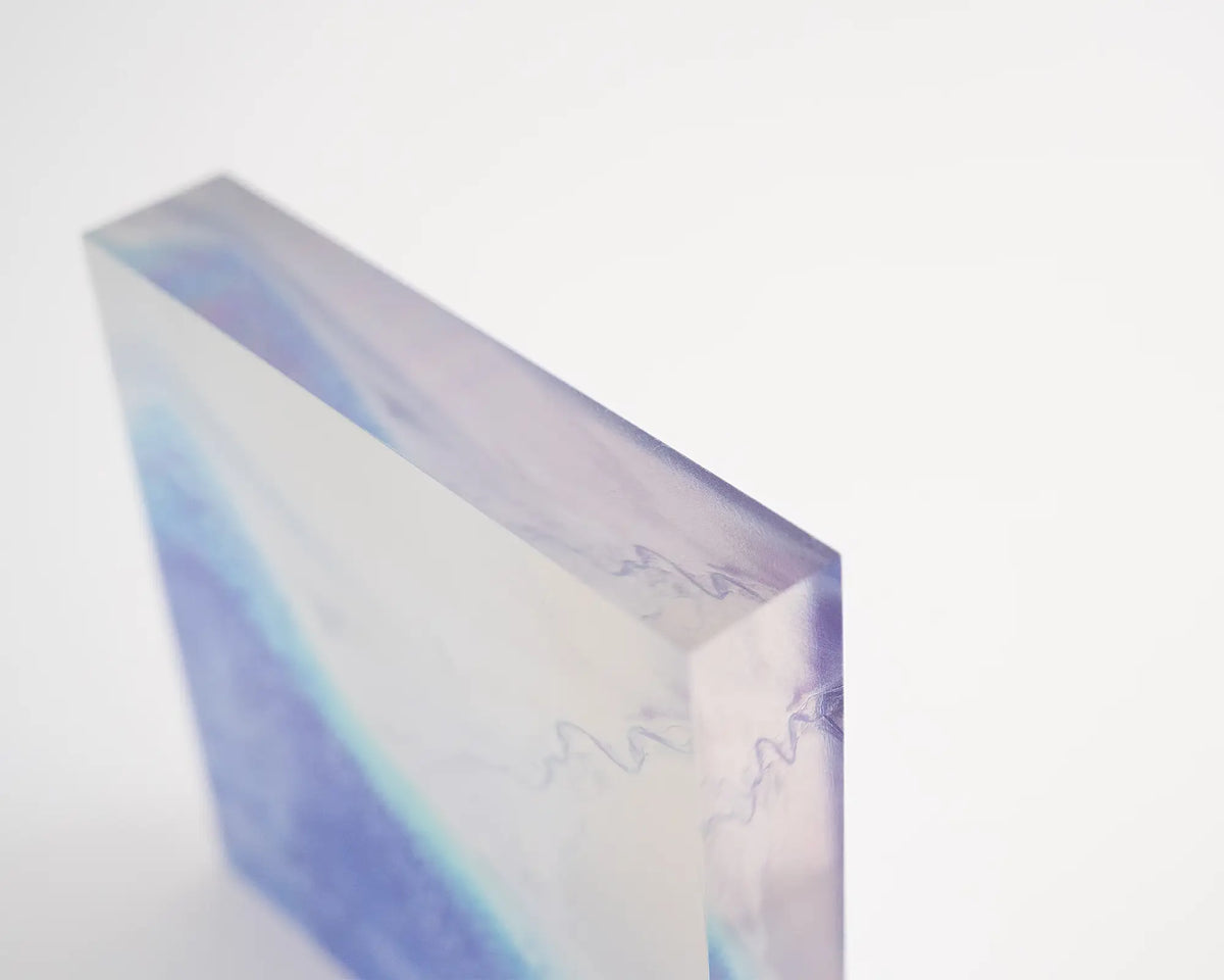 Outlet. Acrylic block of Roebuck Bay Western Australia, top side view showing 3D effect.