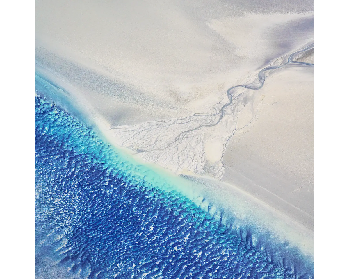 Blue water and white sand, Roebuck Bay, West Kimberley, Western Australia.