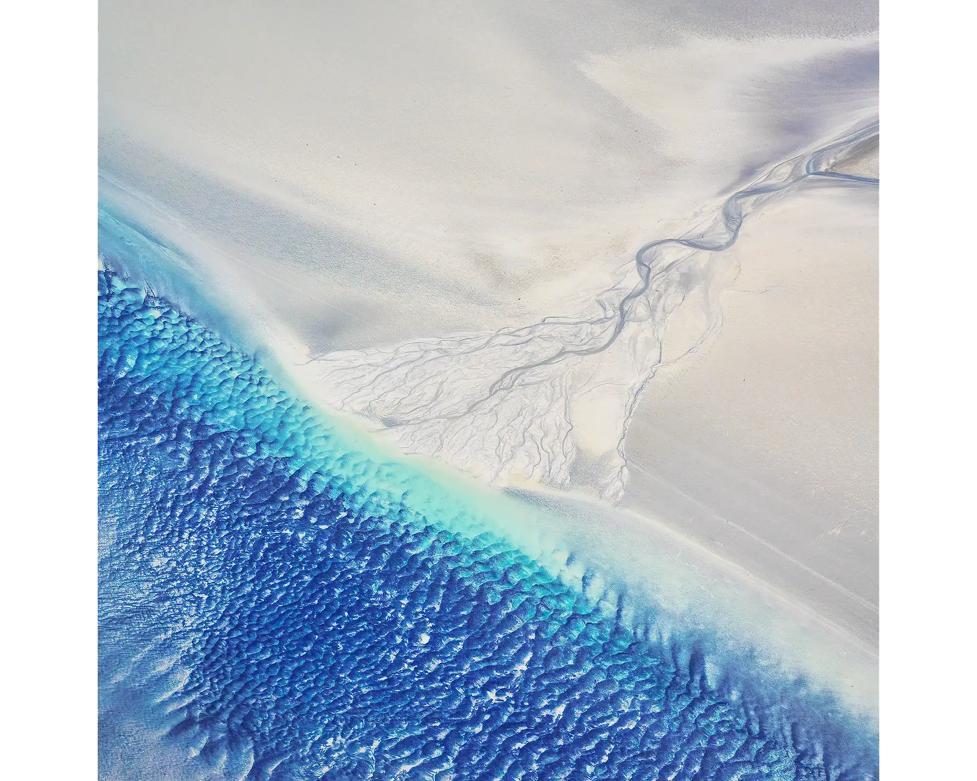 Blue water and white sand, Roebuck Bay, West Kimberley, Western Australia.