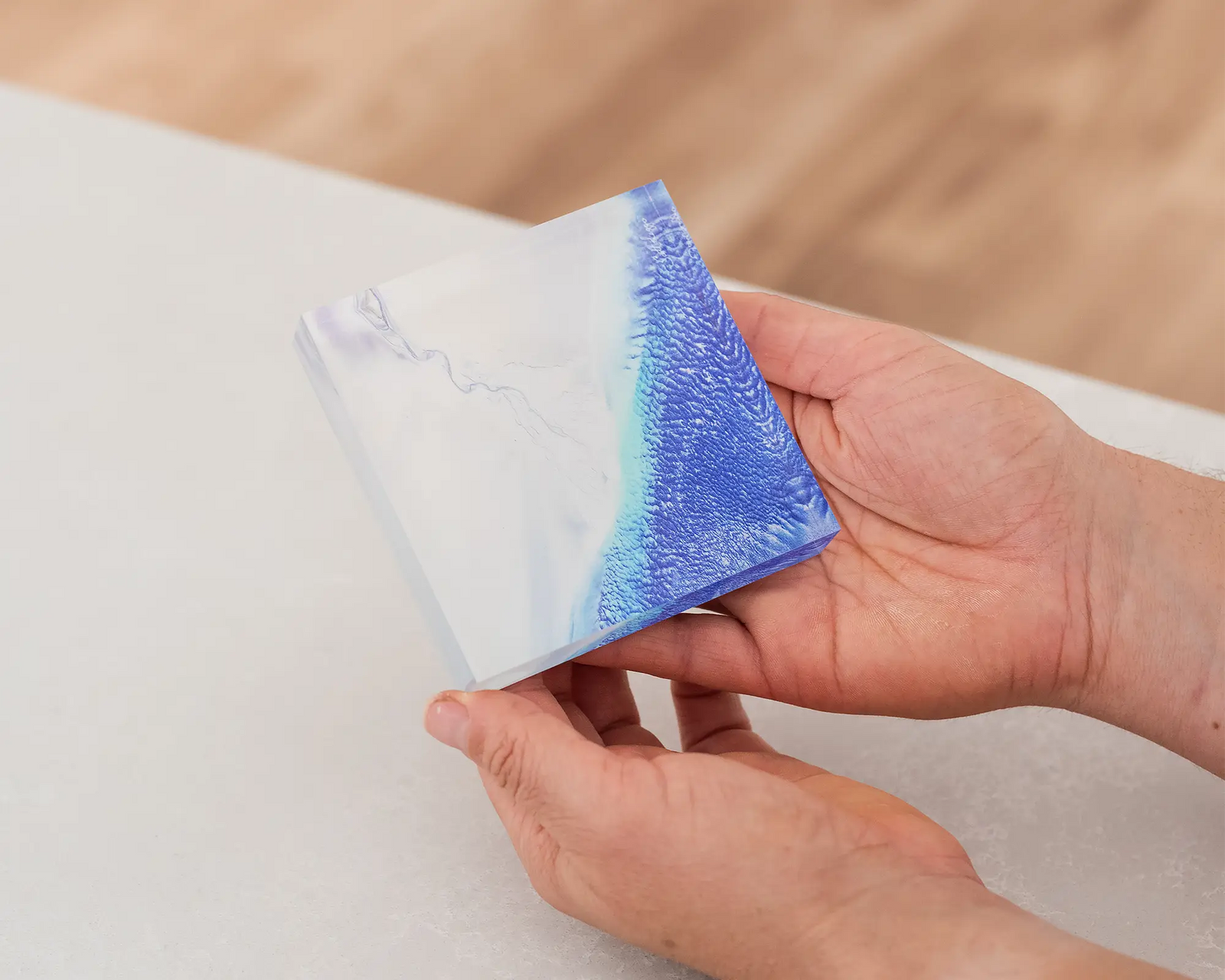 Blue water and white sand seen from above at Roebuck Bay, West Kimberley region, WA. 