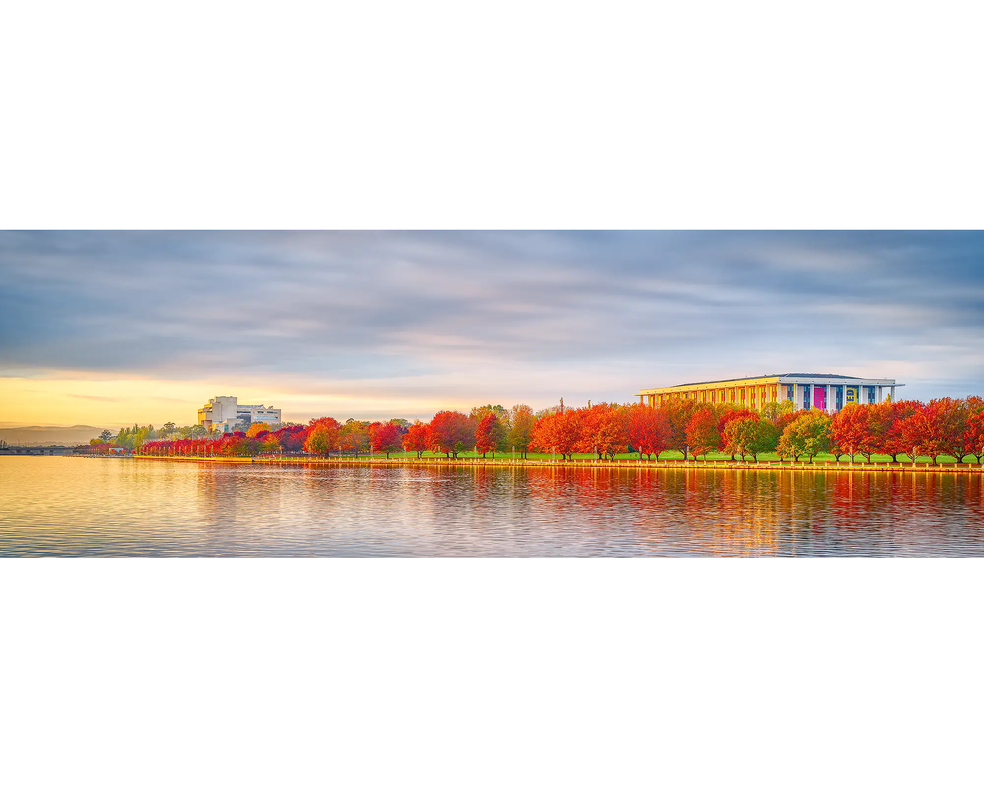 Outlook - sunrise with autumn colours, National Library and High Court, Lake Burley Griffin, Canberra.