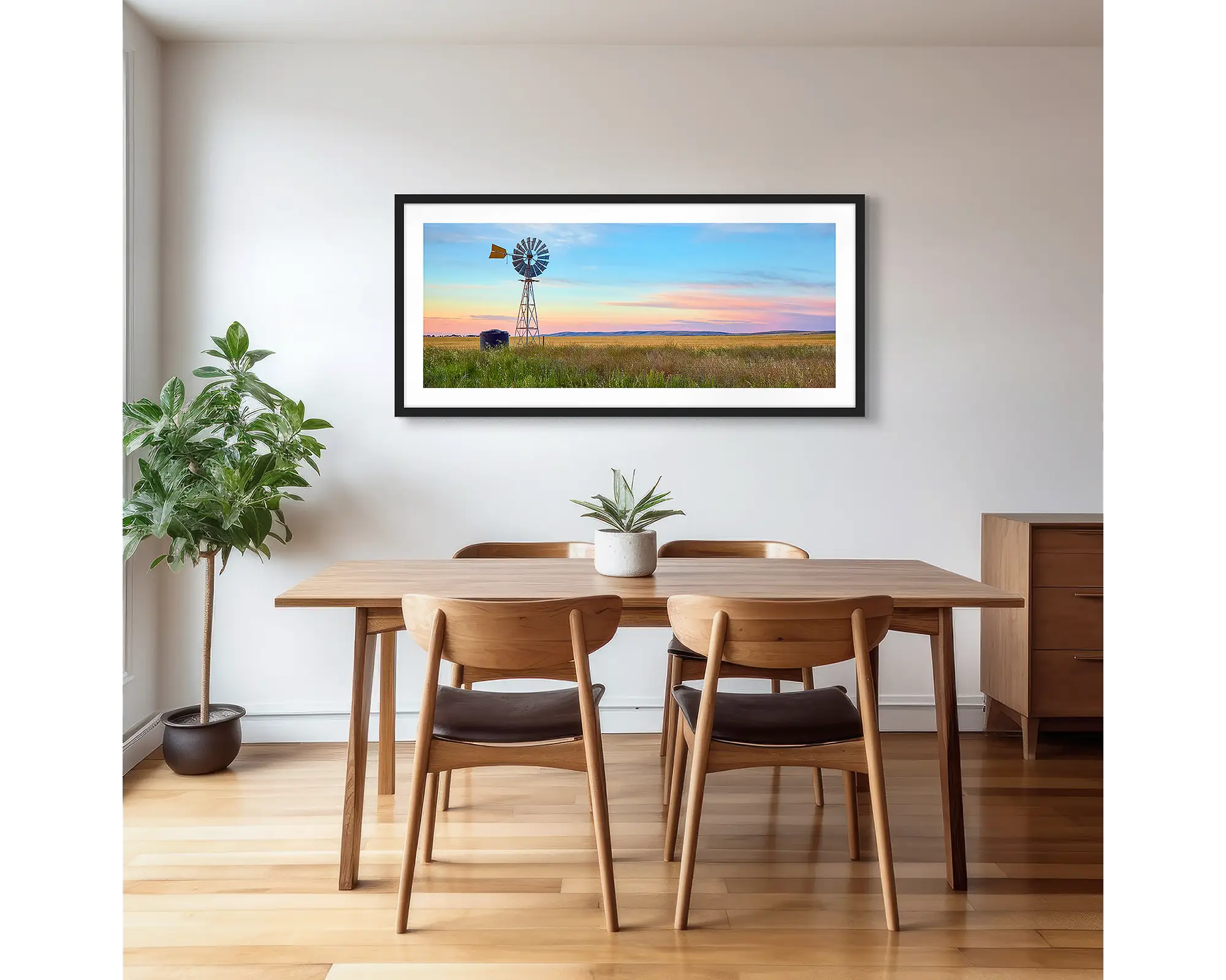 Painted Morning. Windmill on farm with colourful sunrise, South Australia.
