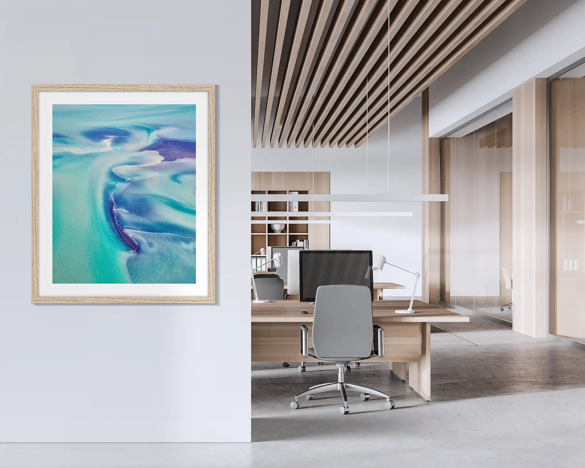 Permeate. Framed abstract Kimberley wall art with a timber frame hung on an office wall. 
