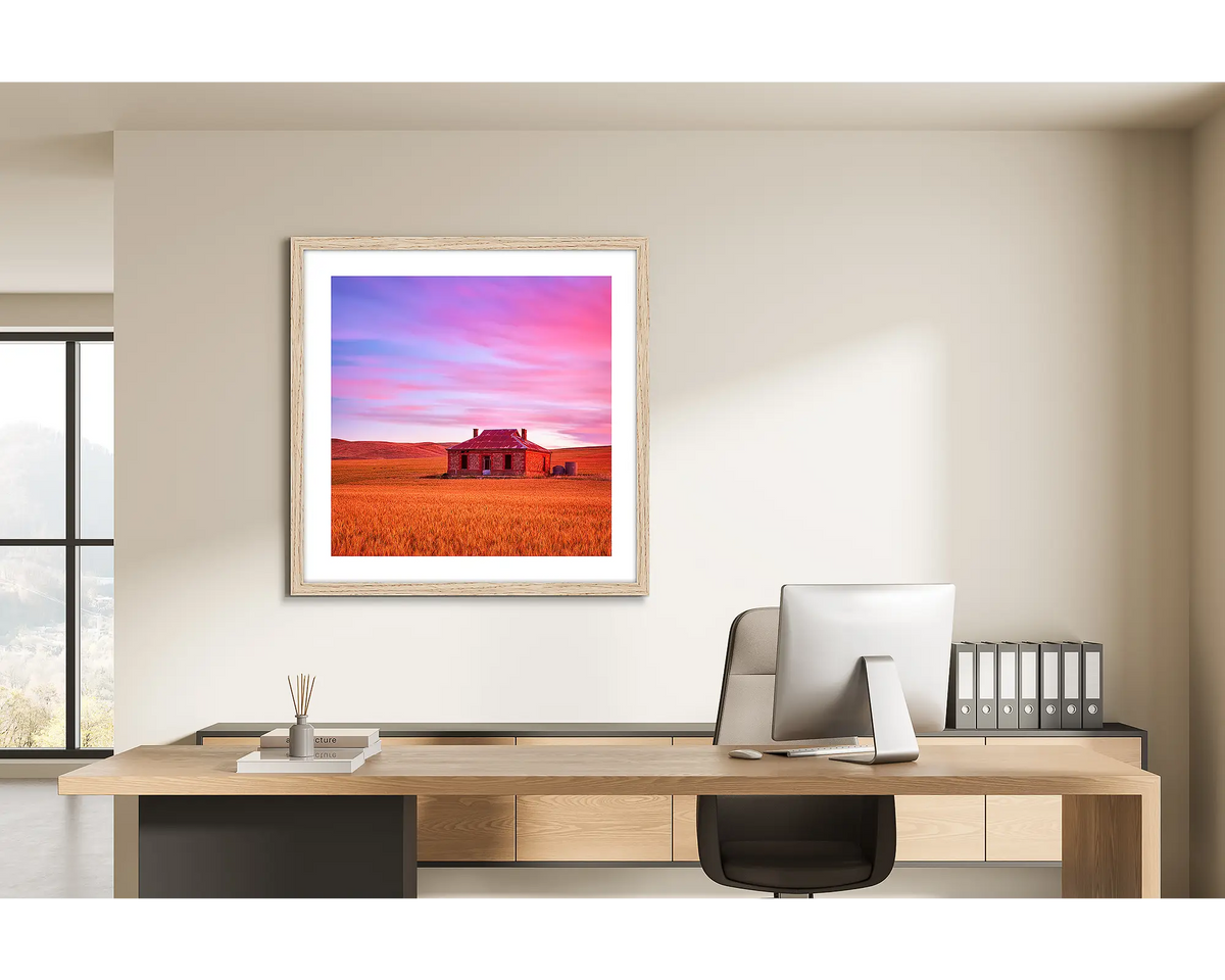 Pioneer. Framed wall art print of an outback farm home, framed with a timber frame and hung in a light filled office. 