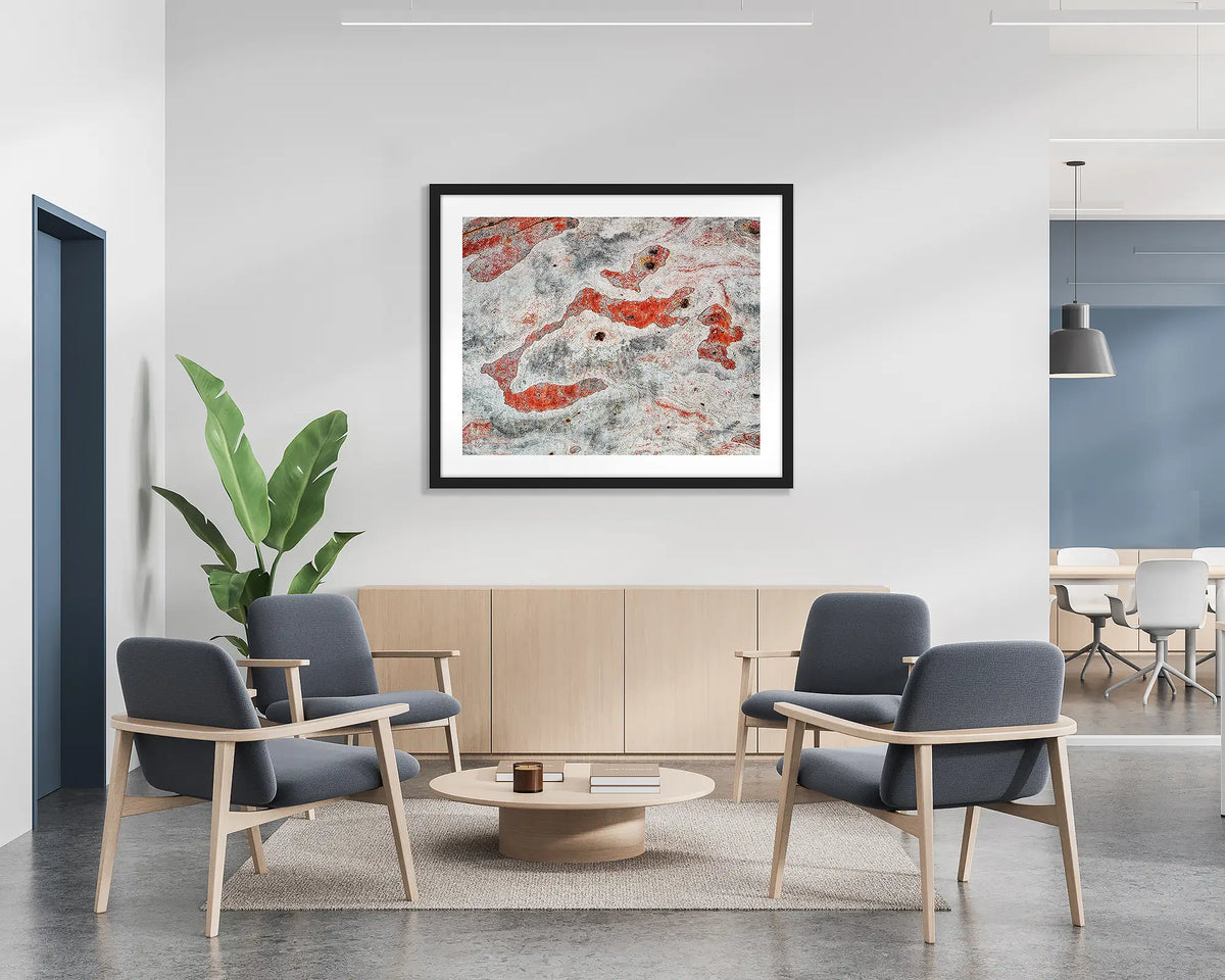 Pursuit. Abstract tree bark, wall art print with a black frame, hung on the wall of a waiting area. 