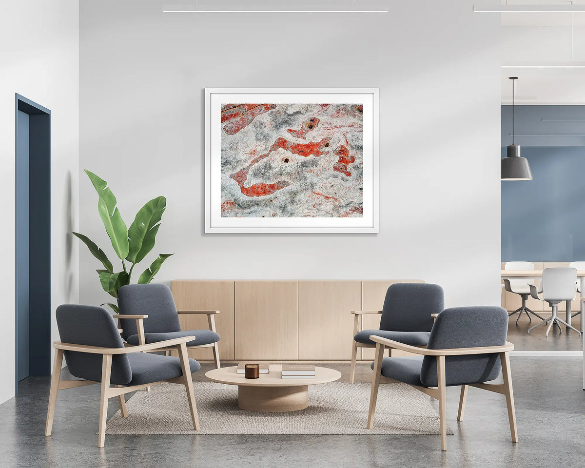 Pursuit. Abstract tree bark, wall art print with a white frame, hung on the wall of a waiting area. 